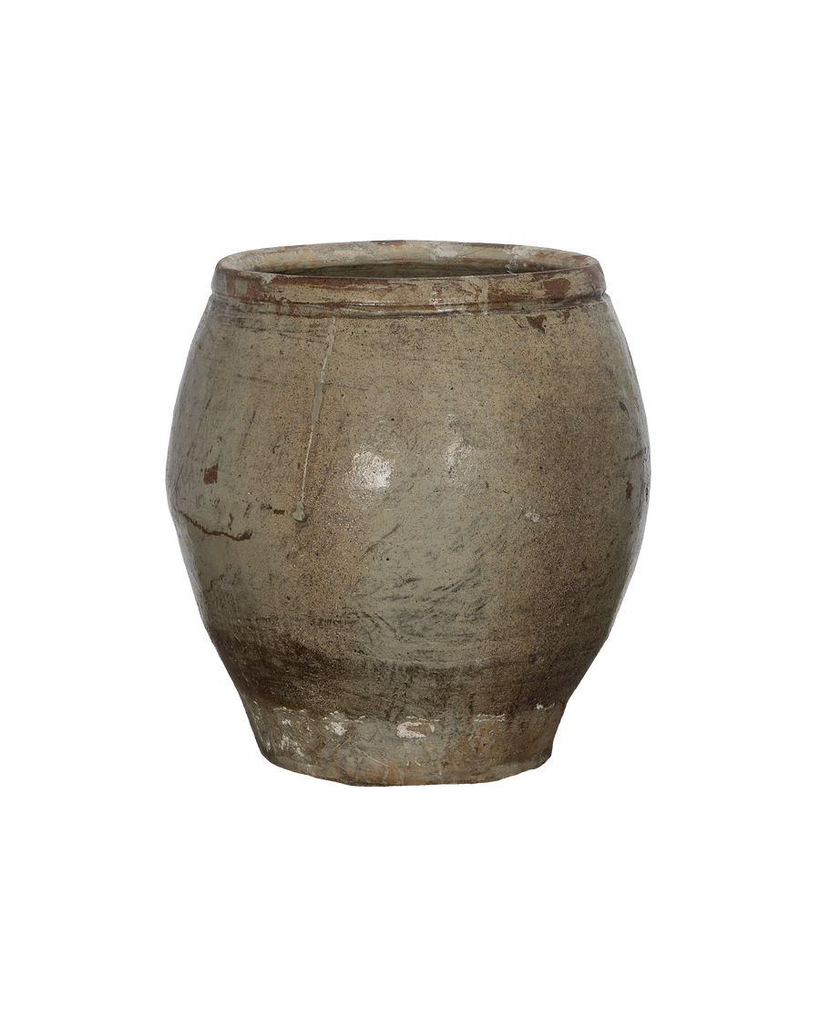 Close-up of vintage Chinese plum planter, showing textured weathered stoneware surface and rim.