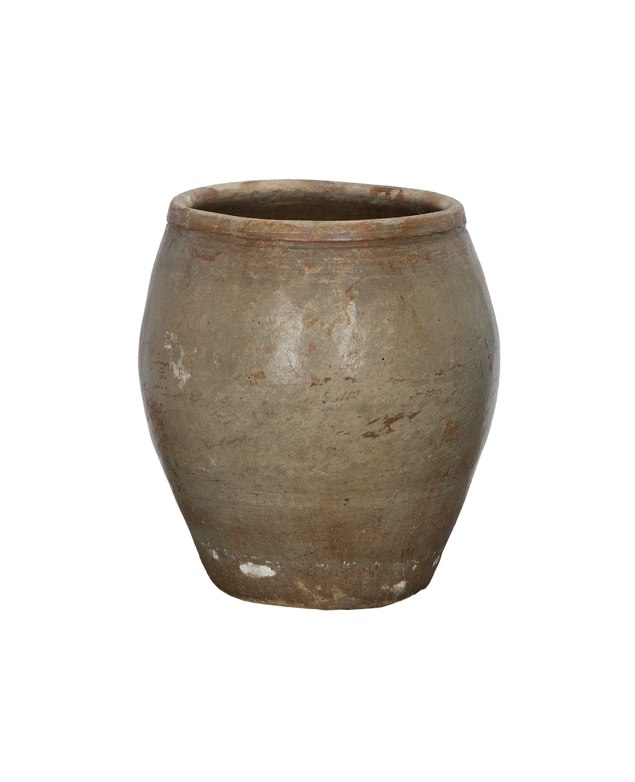 Vintage Chinese ceramic plum planter, close up of textural distressed surface and rim.