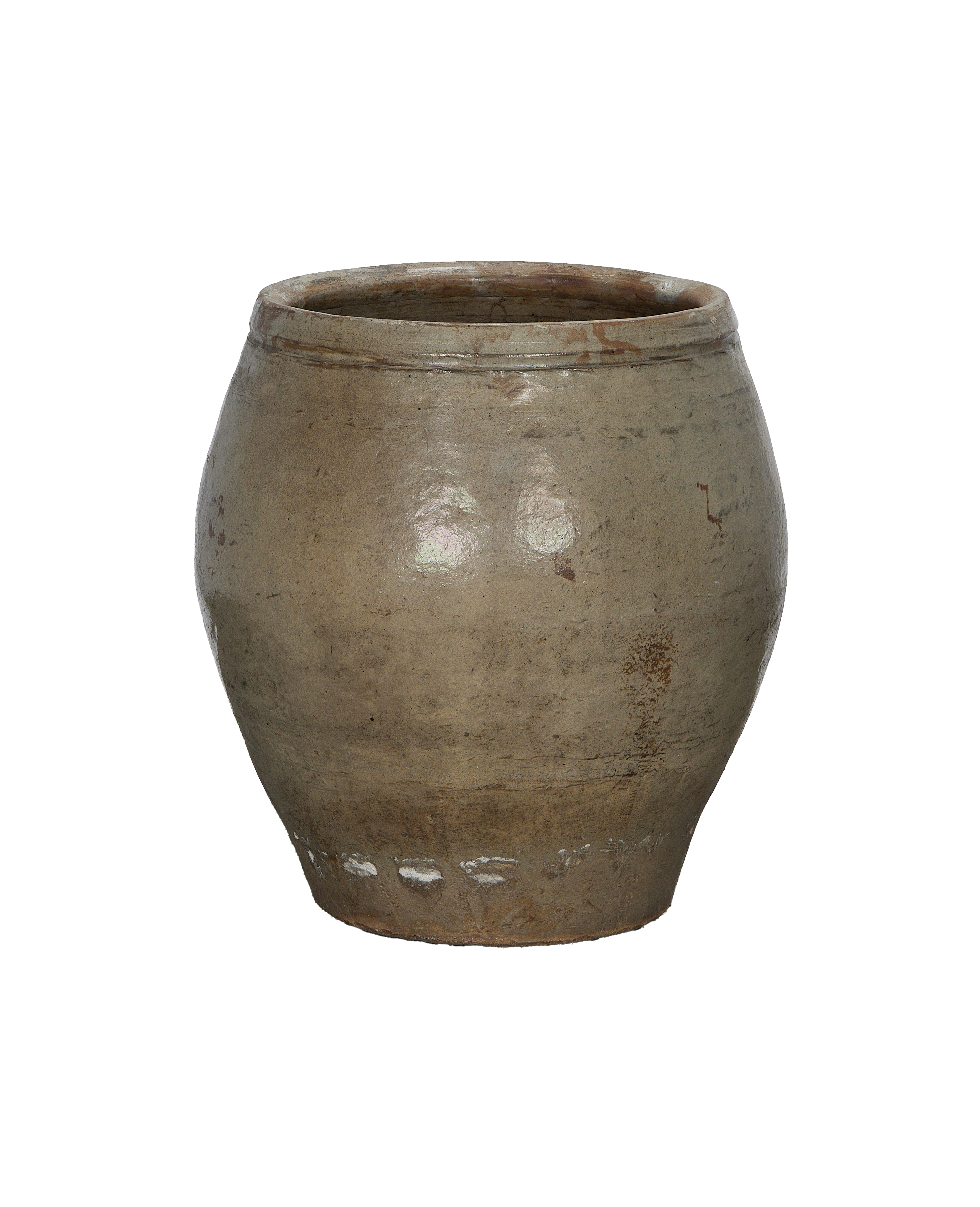 Vintage Chinese ceramic planter, showing rough textured exterior and rim detail on a black background.