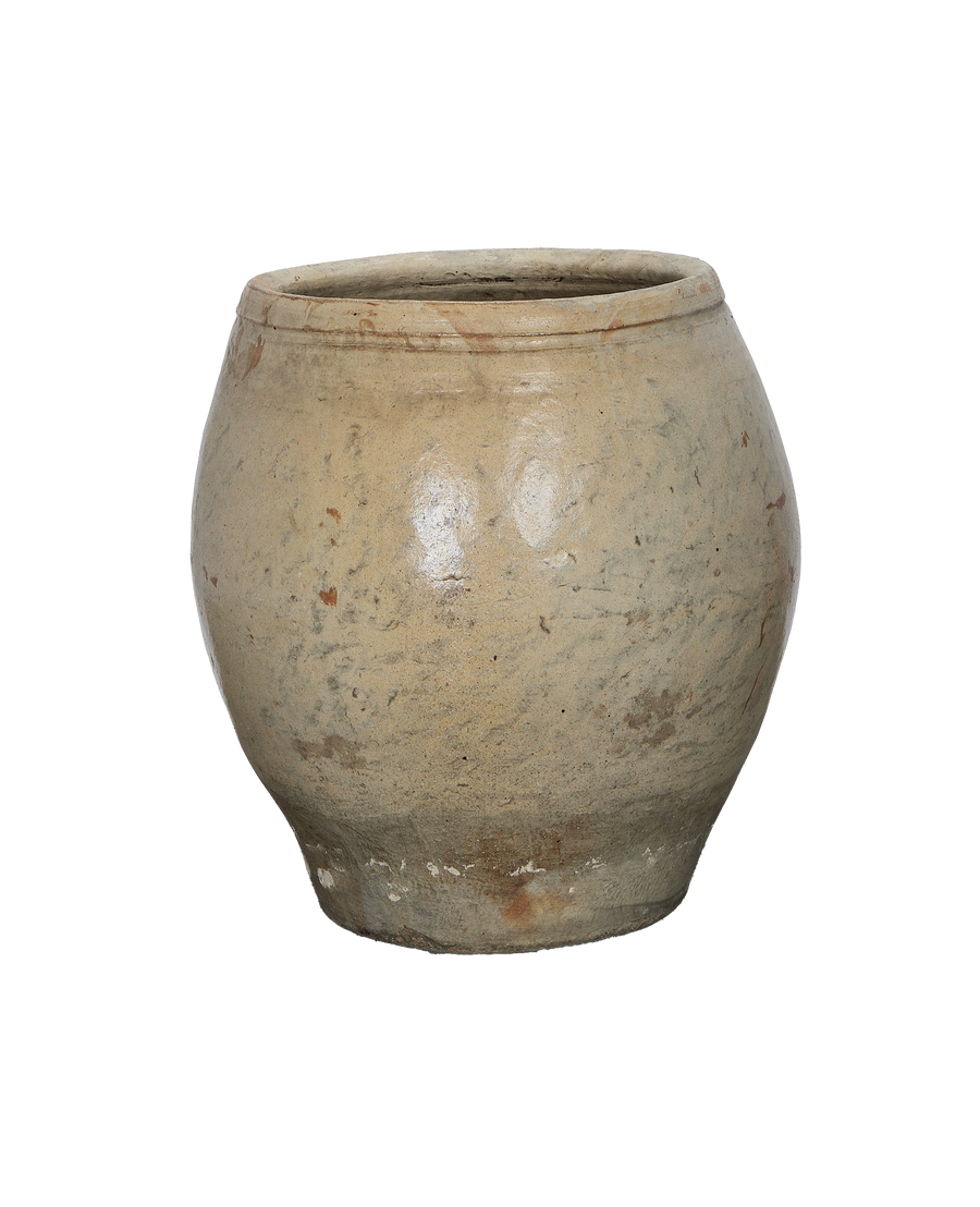 Vintage Chinese plum planter, oak-colored stoneware, showing weathered surface texture from one side.