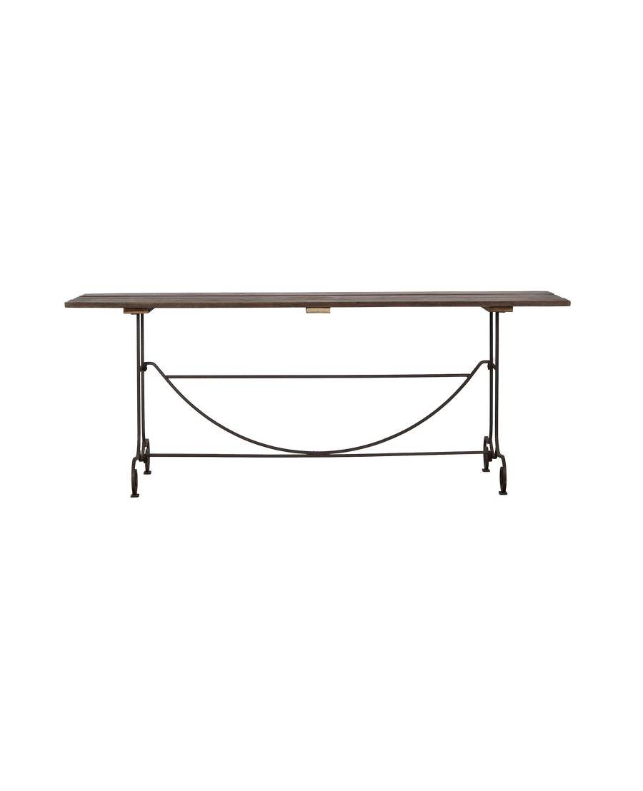 Vintage French wooden oak garden table, iron frame, side view showcasing curved wrought iron stretcher.
