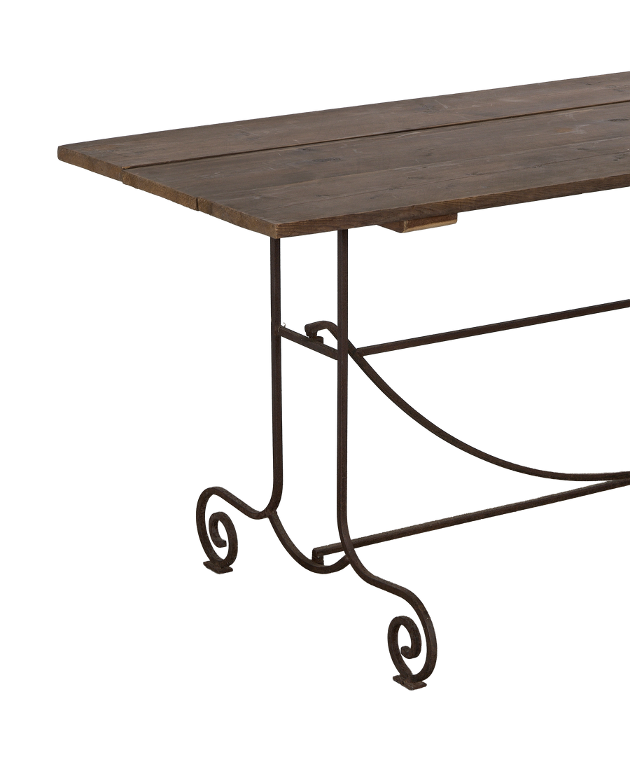 Vintage oak wood garden table with ornate metal base details and distressed finish.