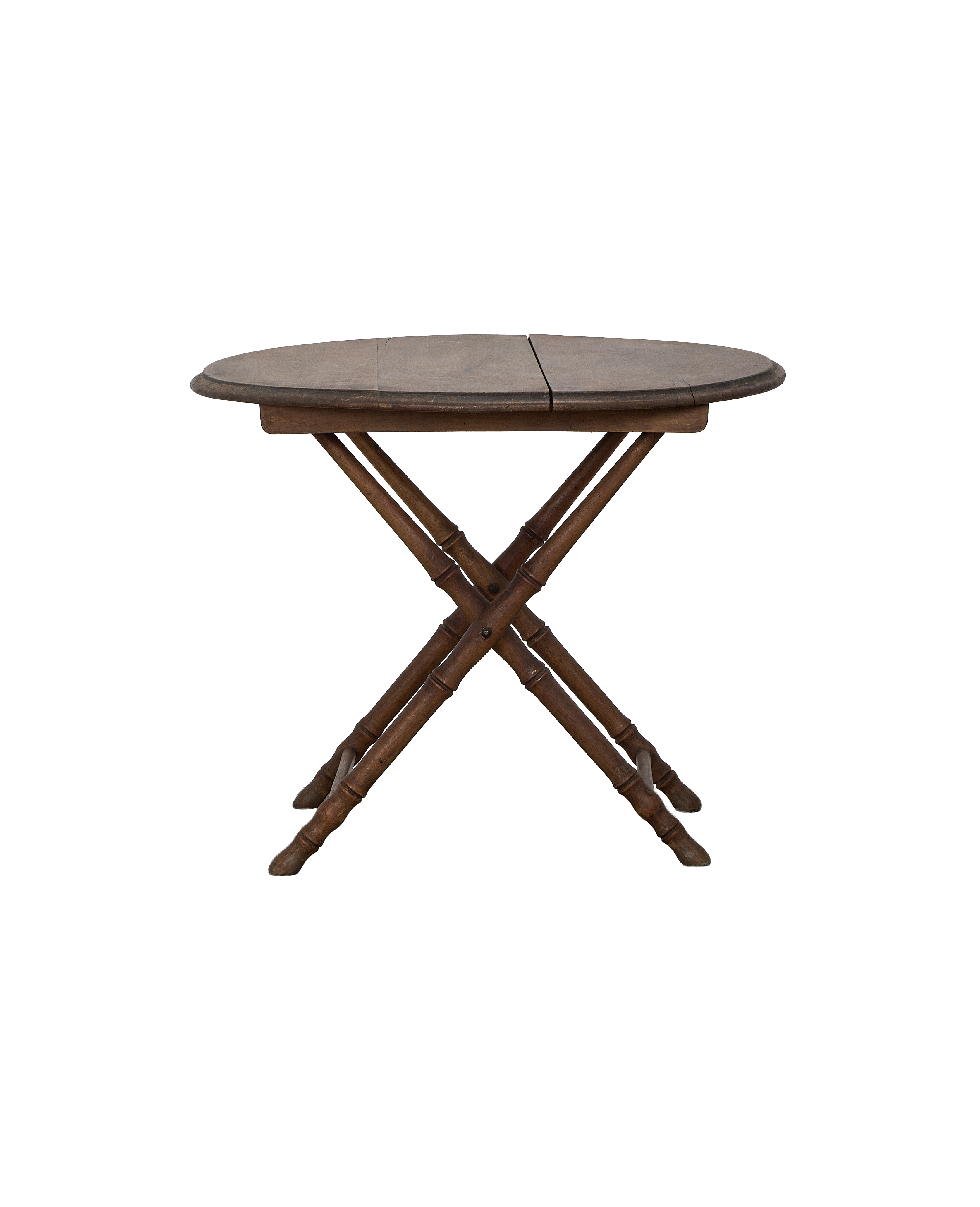 Vintage French oak bamboo folding table with distressed elliptical top and cross legs.