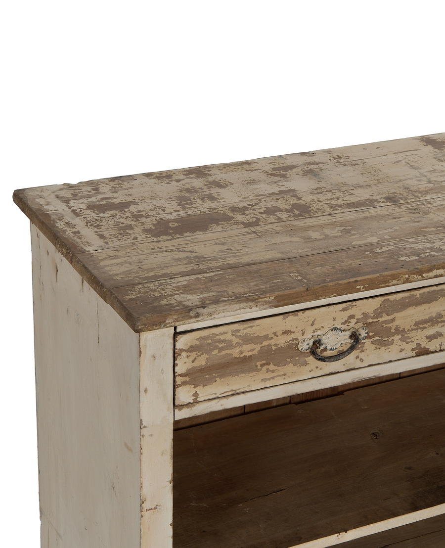 Vintage French painted oak cabinet, showing distressed white paint, single drawer with decorative pull.
