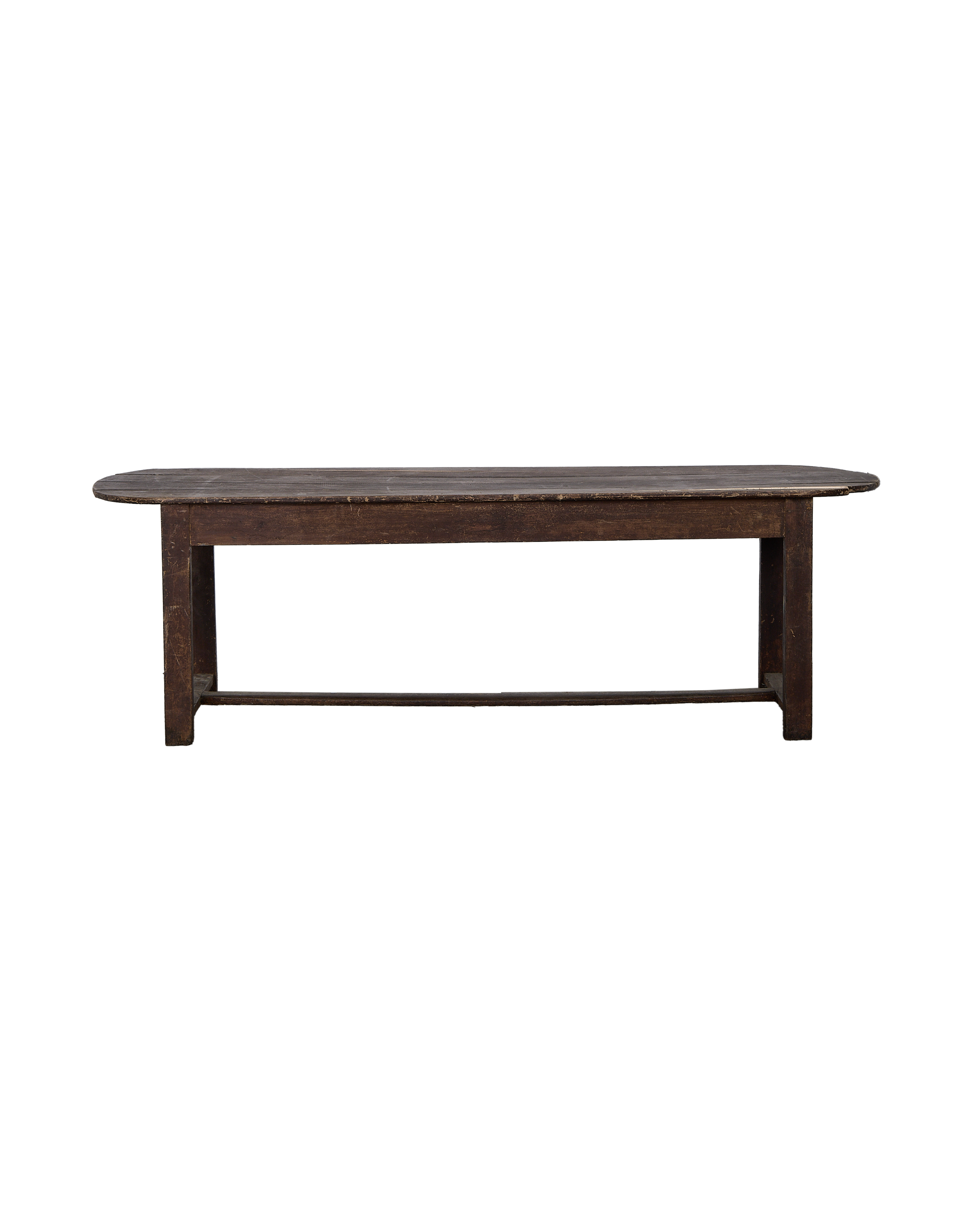 Vintage French oval oak table, showing rustic planked top with distressed finish.
