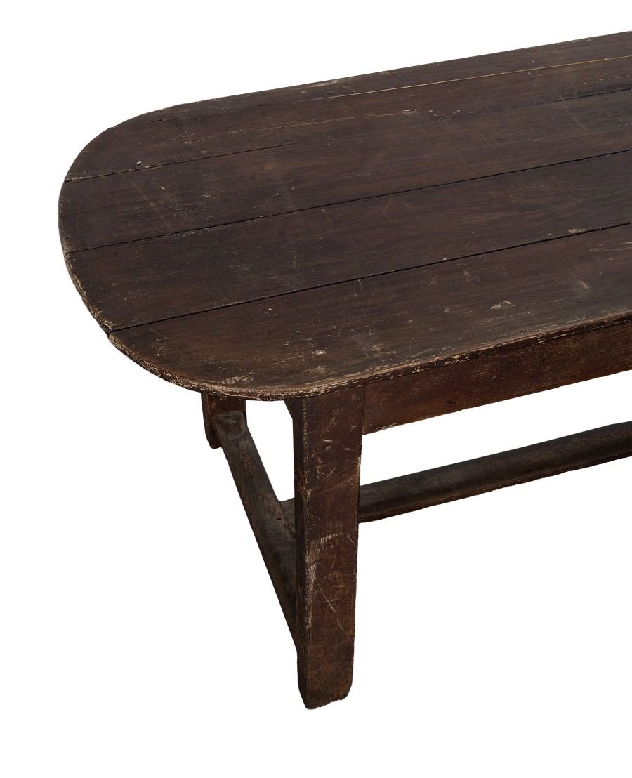 Vintage French oak oval table, detail of tabletop showing aged wood and distressed finish.