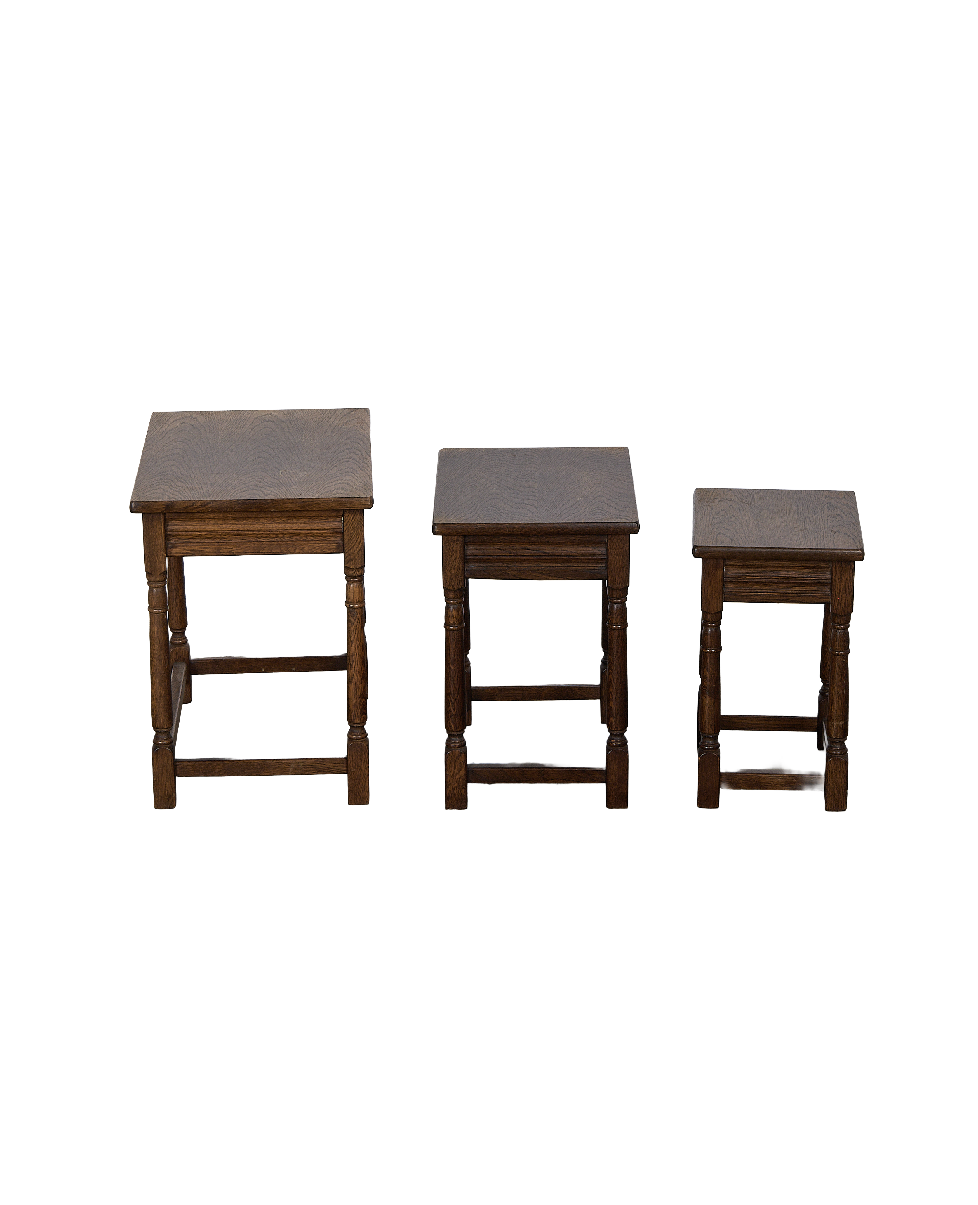 Vintage French oak Barley Twist nesting tables, set of three, showcasing different sizes side-by-side.