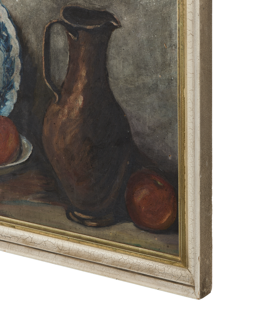 Vintage French still life painting, showing textural detail of jug and crackled white oak frame.