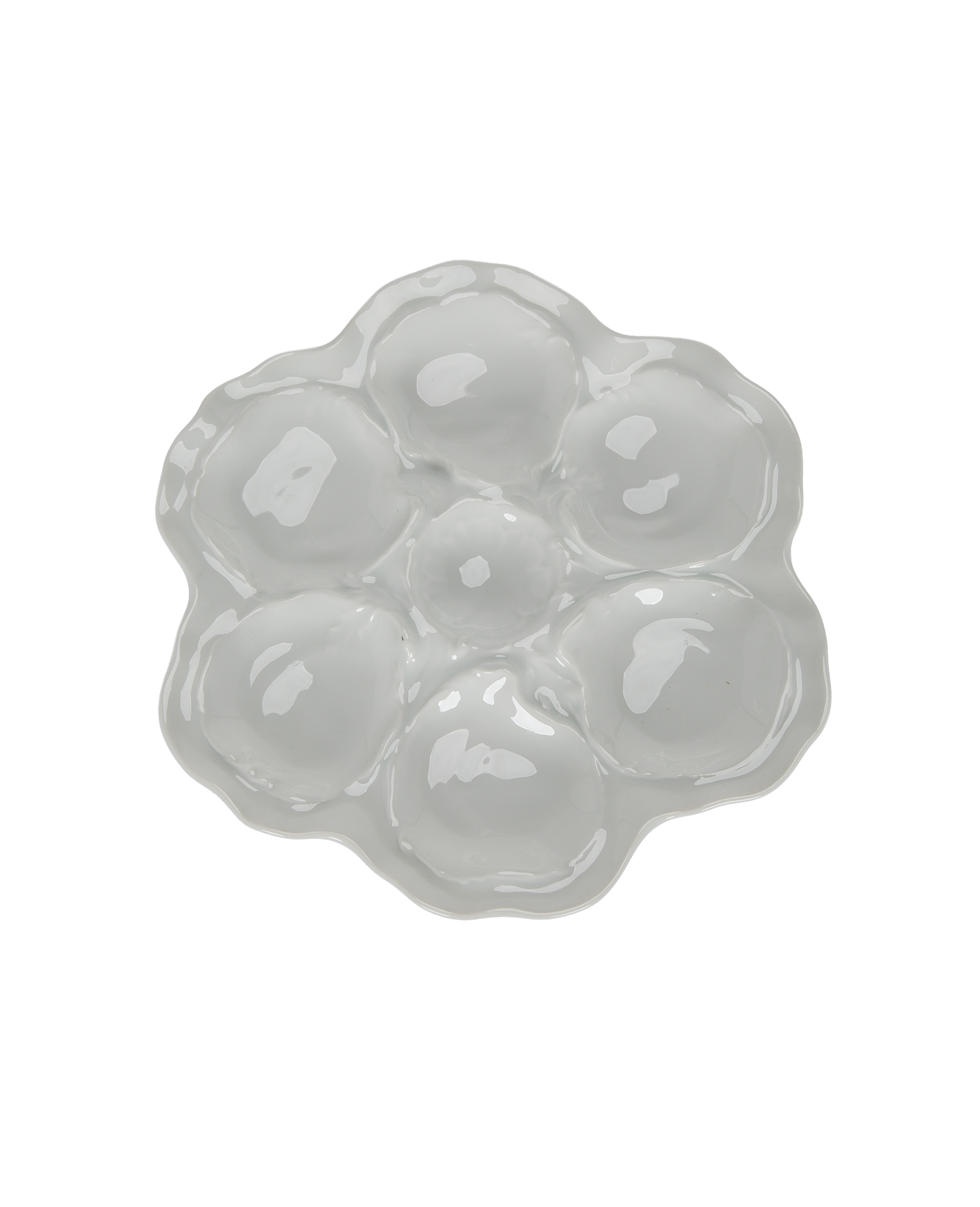Vintage Limoges oyster plate, white porcelain, six shell-shaped wells, top-down view.