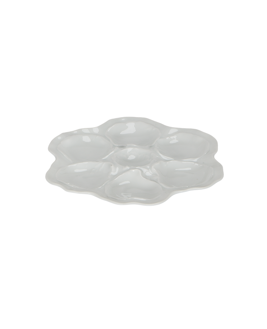 Vintage Limoges oyster plate, white ceramic, top-down view showing six wells.