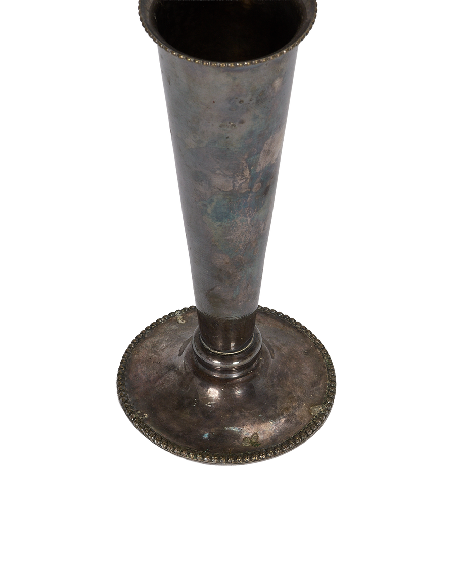 Vintage French pewter bud vase with decorative base, showing patina and wear.