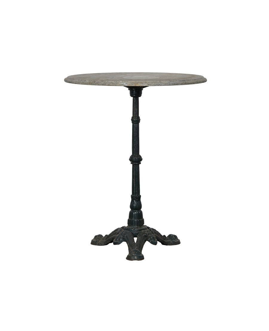 Vintage French marble bistro table, with its distressed gray top and ornate cast iron base.
