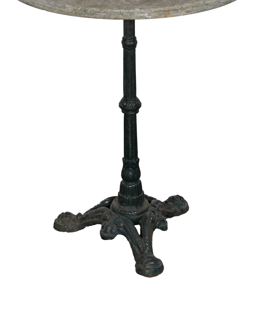 Vintage French marble-top bistro table, close-up of intricate cast iron base and support column.