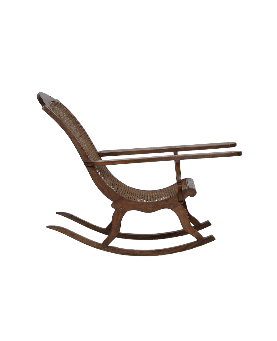 Vintage French oak lounge chair, rocking profile, showcasing beautiful cane weaving.