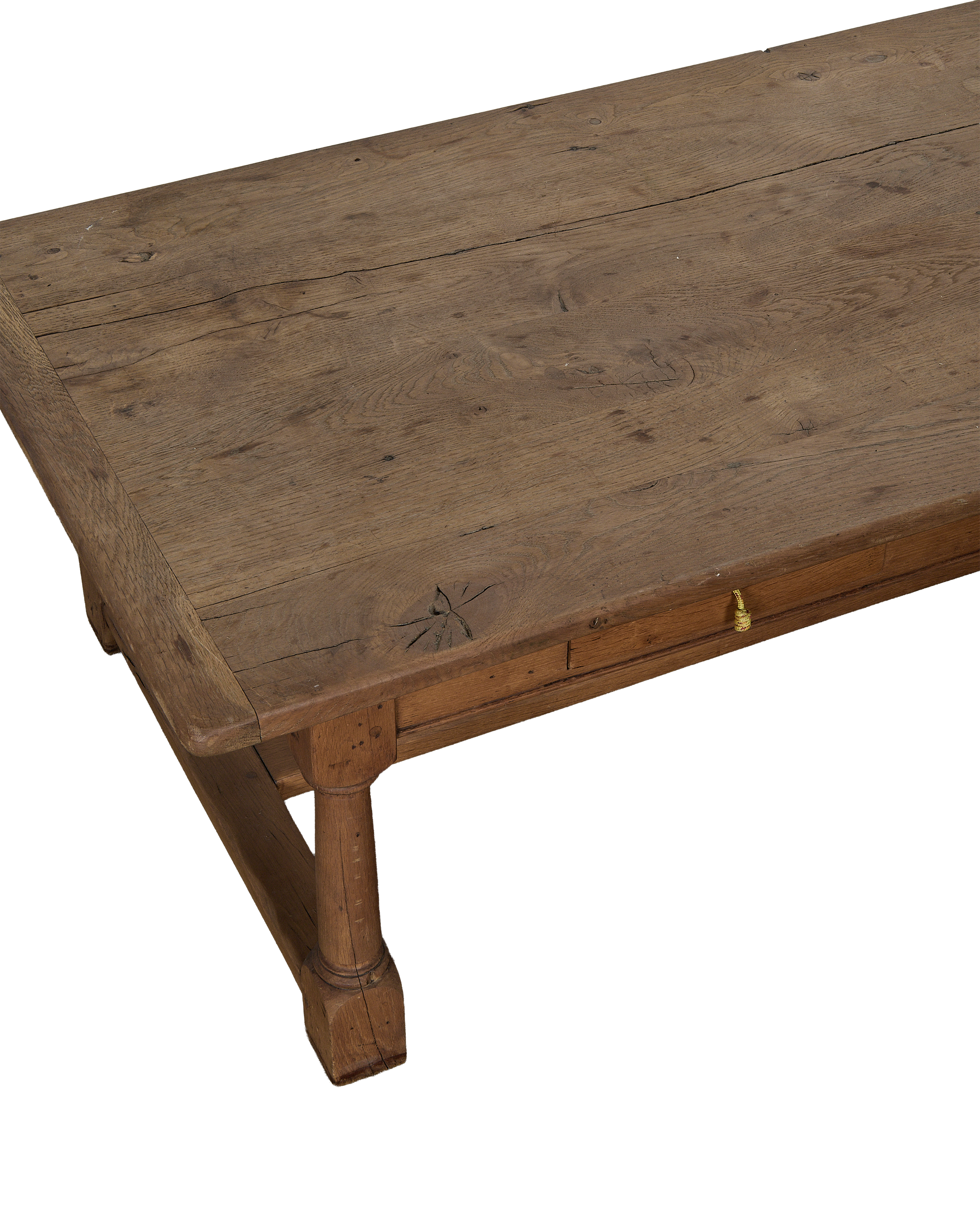 Vintage French Draper style oak coffee table, showcasing tabletop texture, drawer, and turned leg.