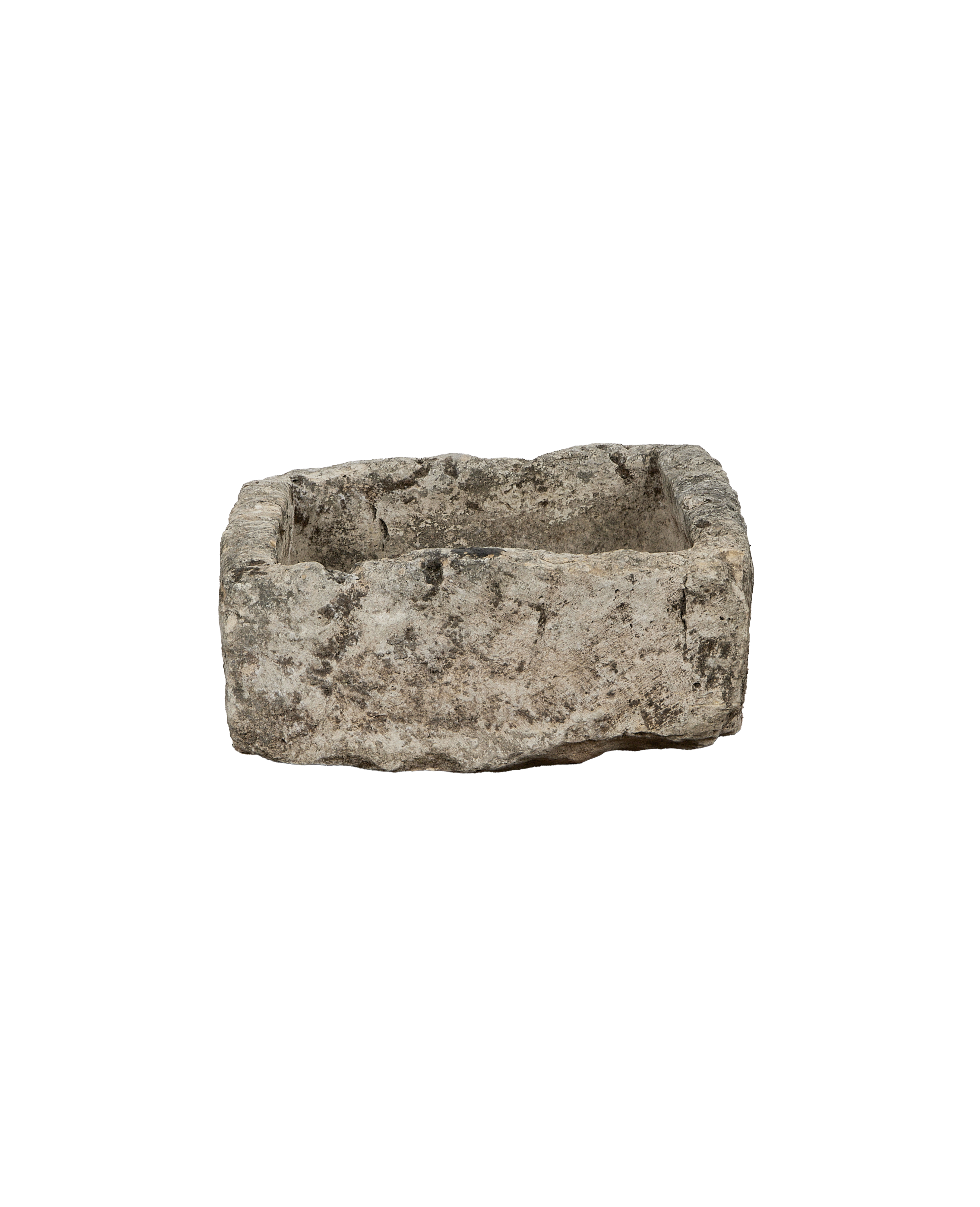 Vintage rectangular limestone trough, weathered surface texture visible