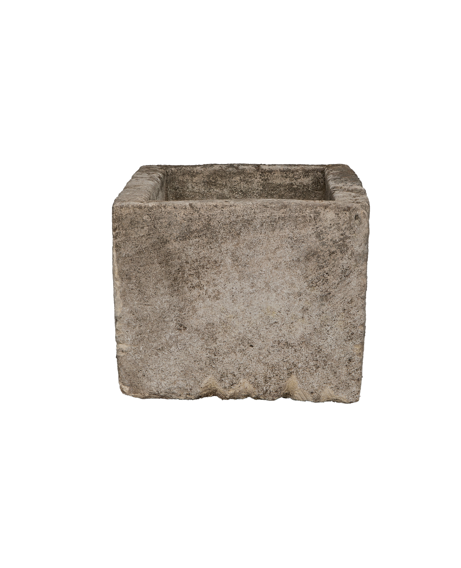 Vintage Indonesian limestone trough, showing weathered texture and square