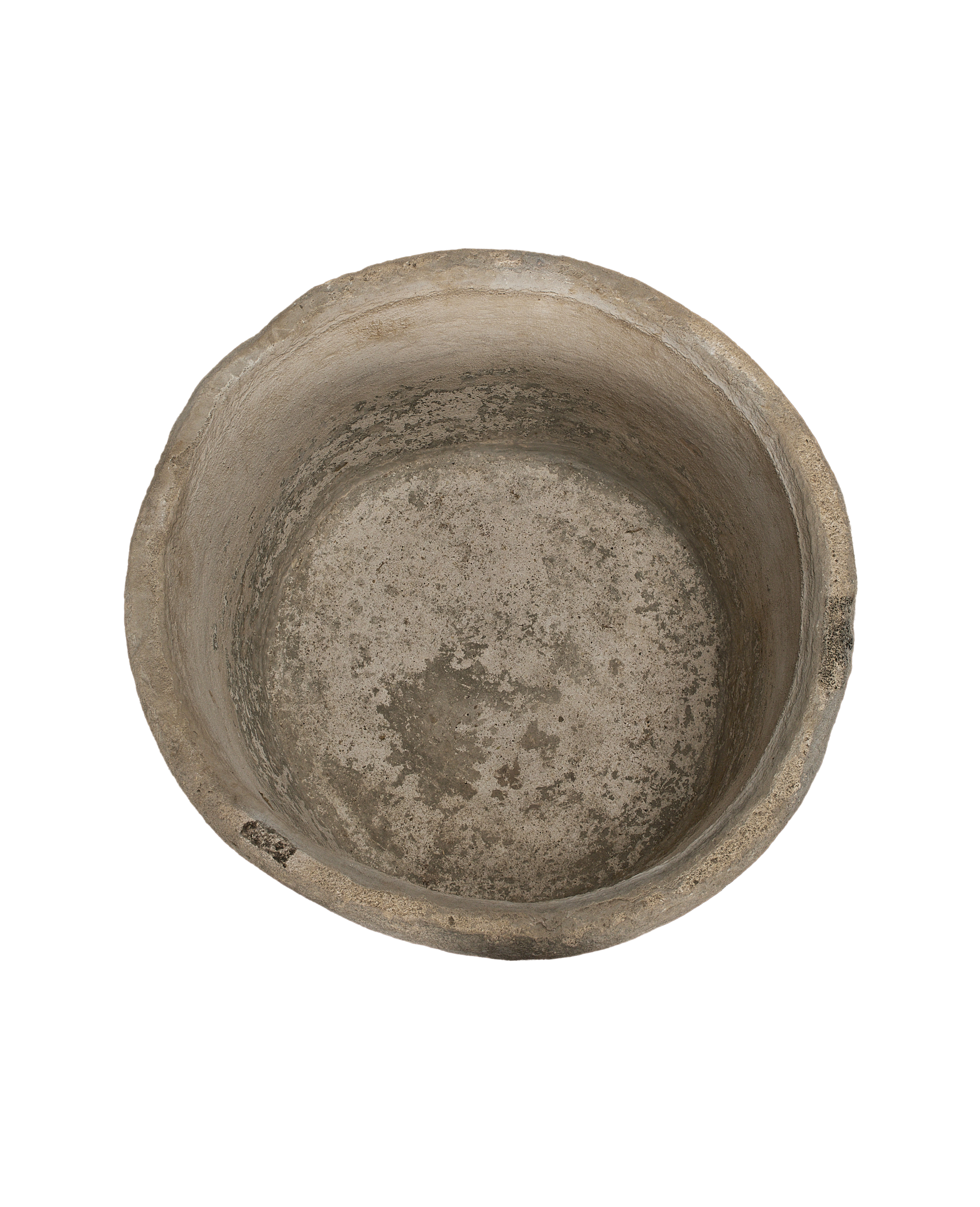 Vintage Indonesian round limestone trough, aged interior showing texture and