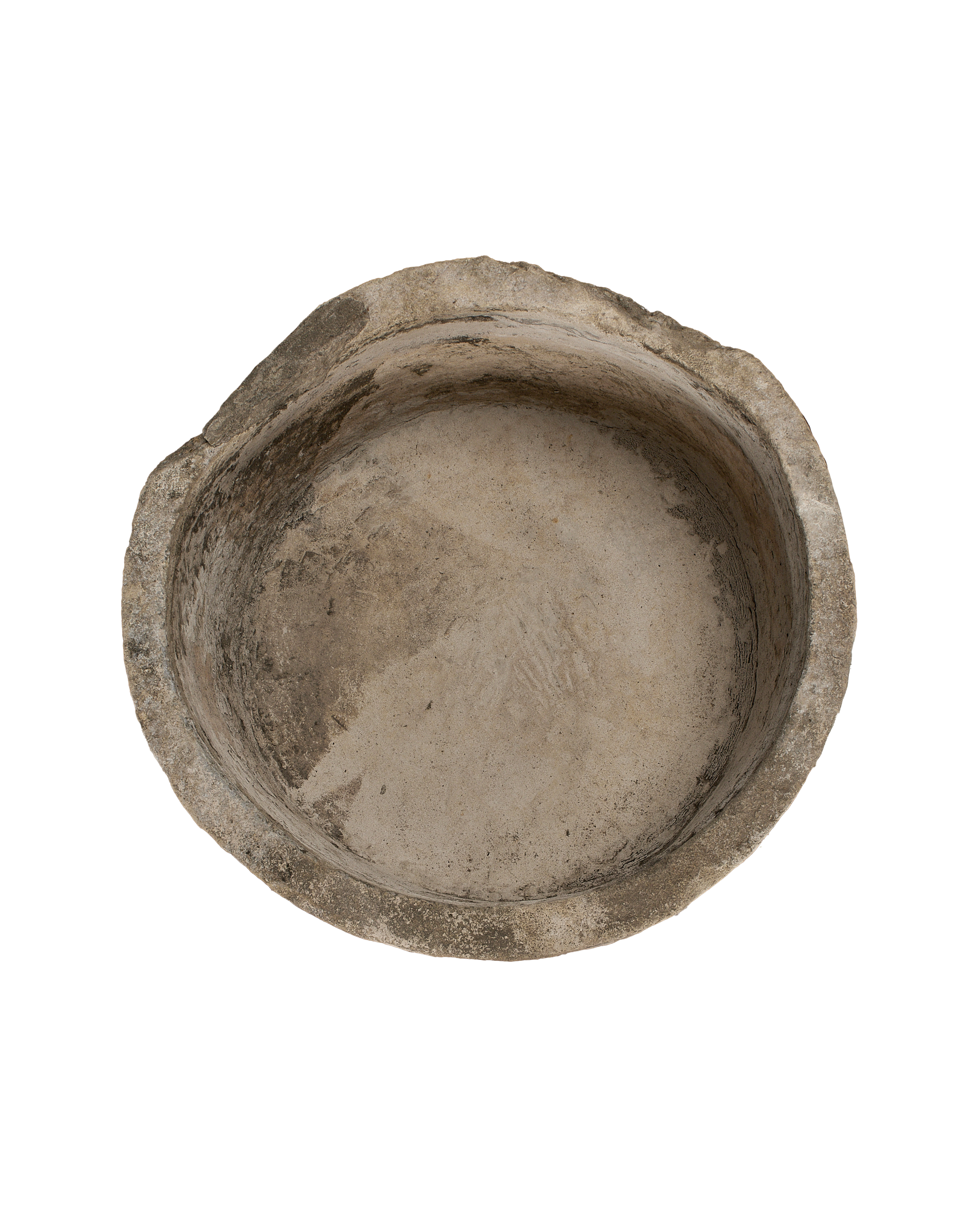 Vintage Indonesian limestone trough, top-down view showing weathered interior texture and condition.