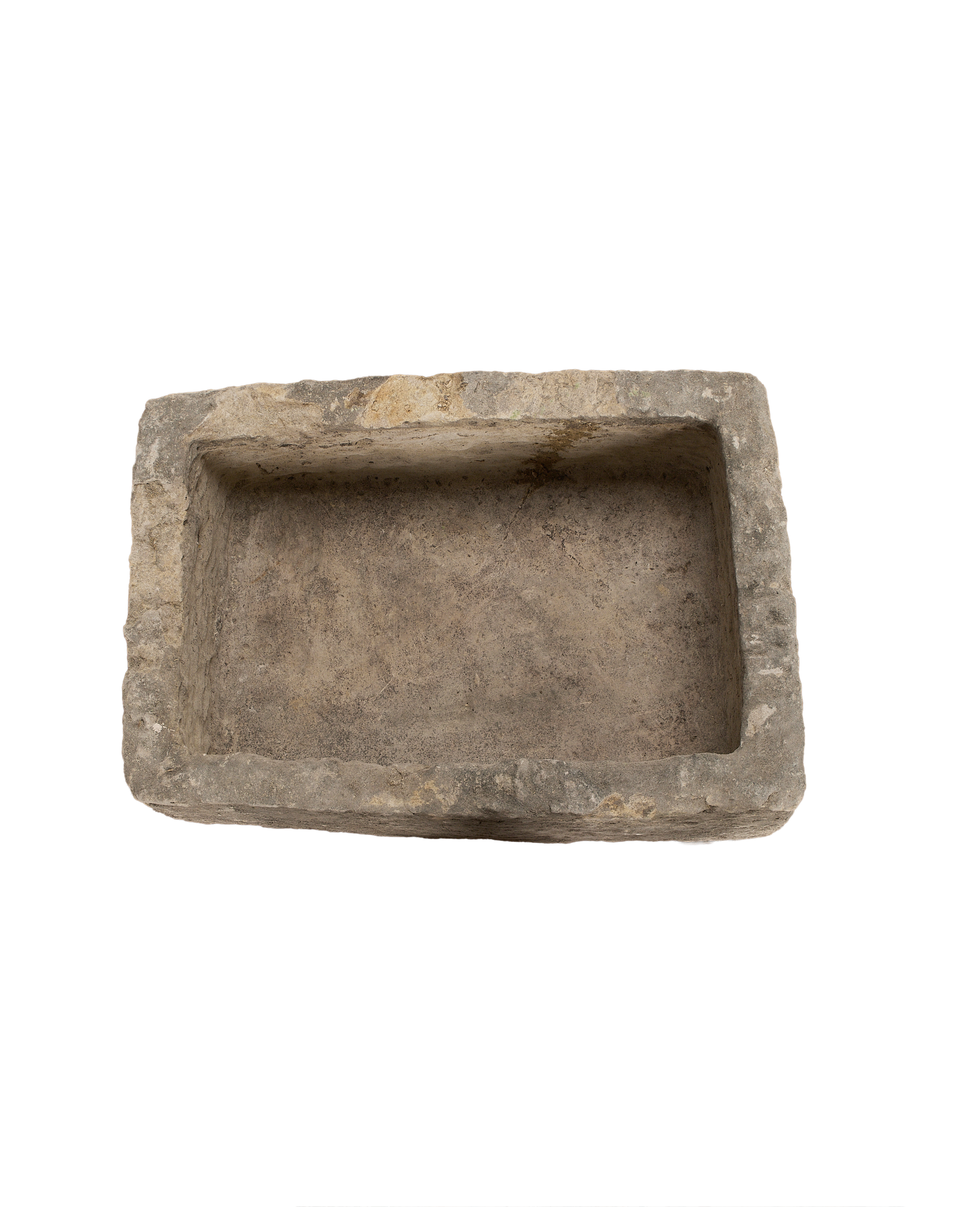 Vintage Indonesian limestone trough, top-down view highlighting textured interior and rough-hewn edges.