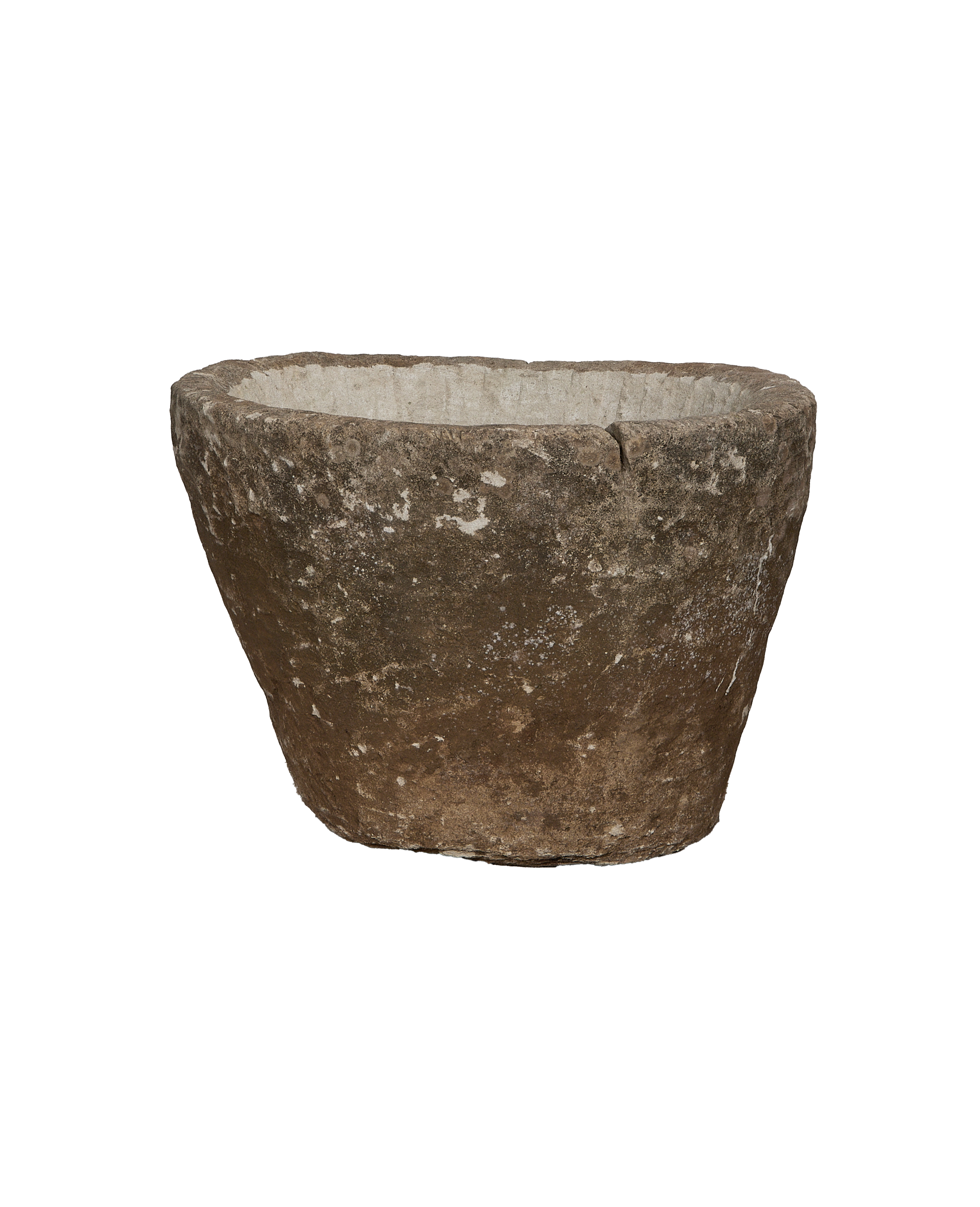 Vintage round limestone trough, side view revealing rustic texture and natural aged patina.