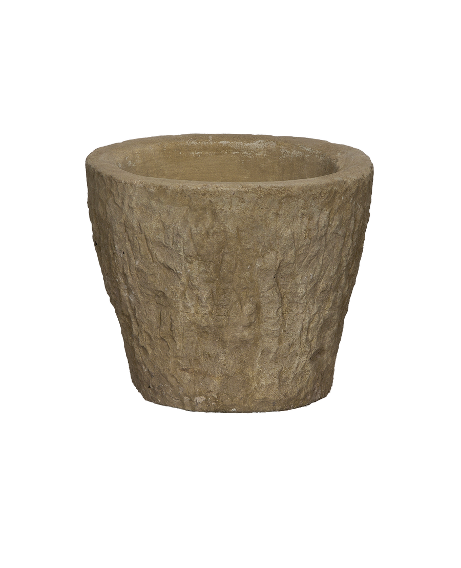 Vintage Indonesian round limestone trough, side angle showcasing textured surface