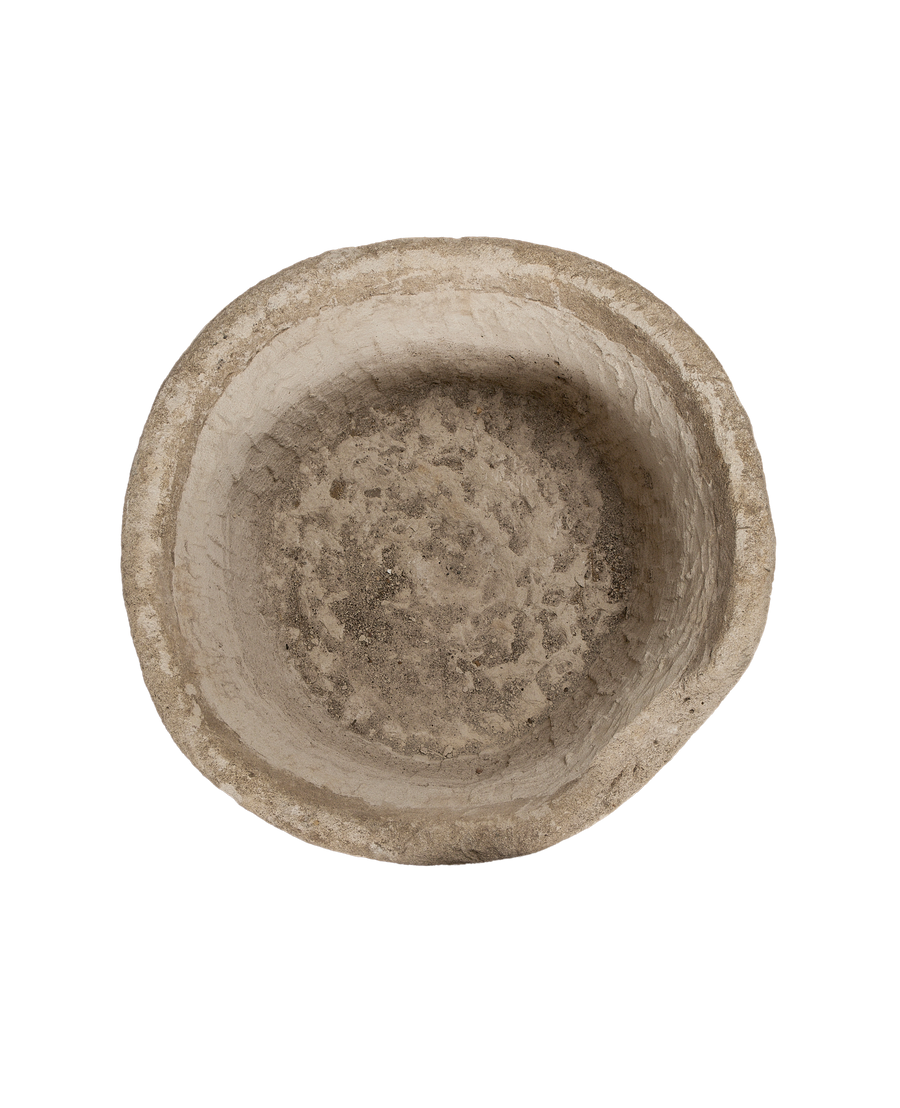 Vintage Indonesian limestone trough, top view, showing rough, textured interior