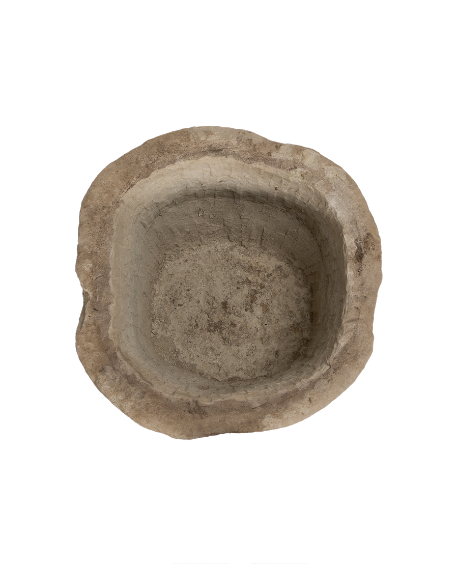 Vintage Indonesian oblong limestone trough, detailed overhead view showing weathered interior and