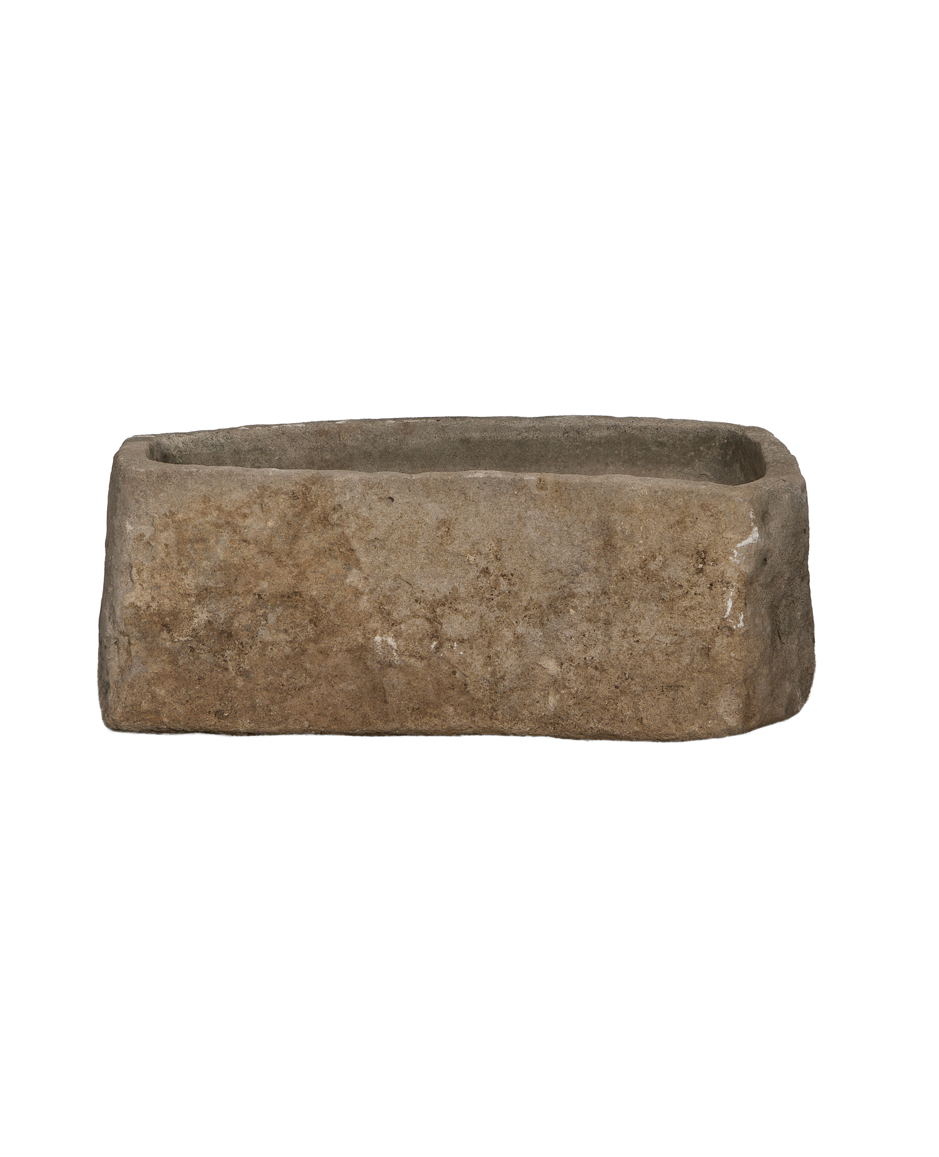 Vintage Indonesian limestone trough, rectangular, showing rough textured side surface and aged condition