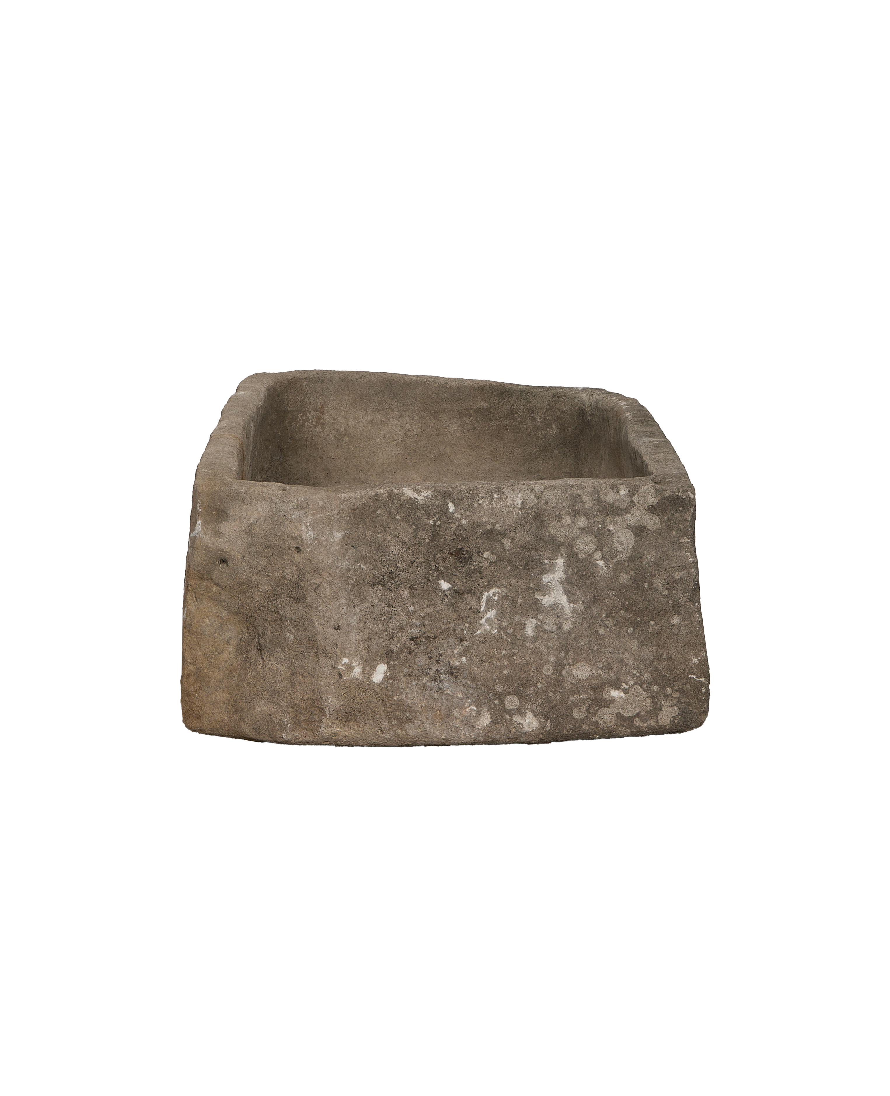 Vintage Indonesian limestone trough showing weathered, rugged