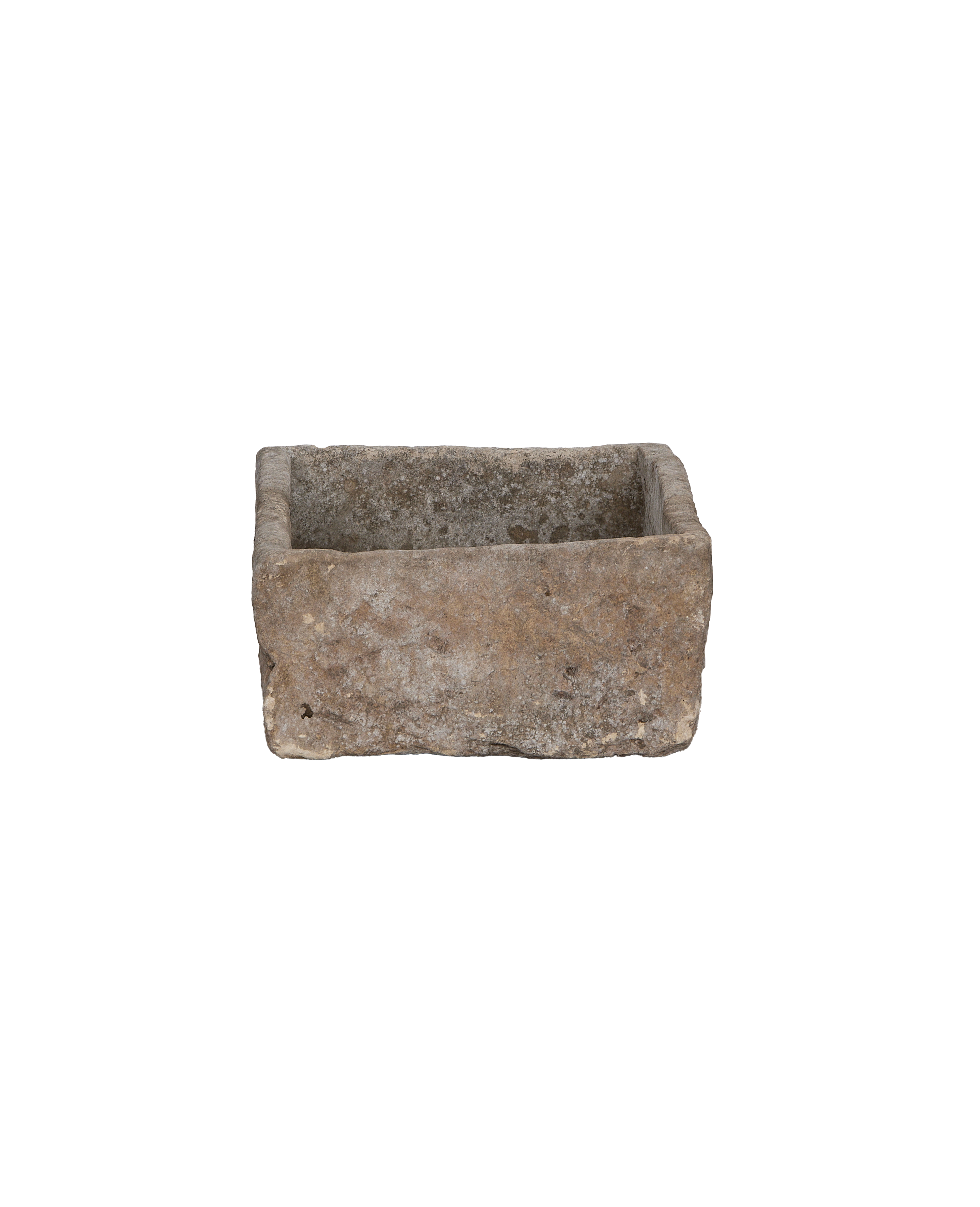 Vintage rectangular limestone trough, close-up of textured interior and weathered