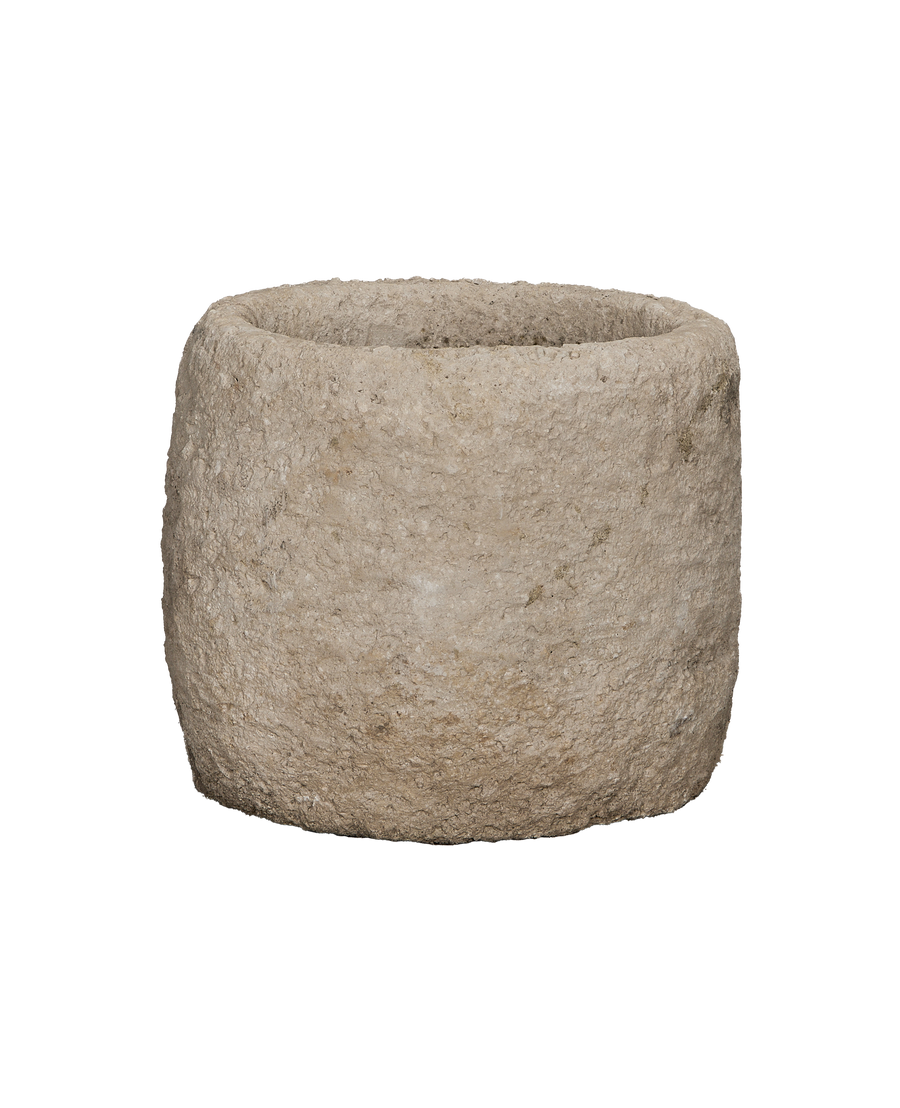 Vintage round Indonesian limestone trough showing