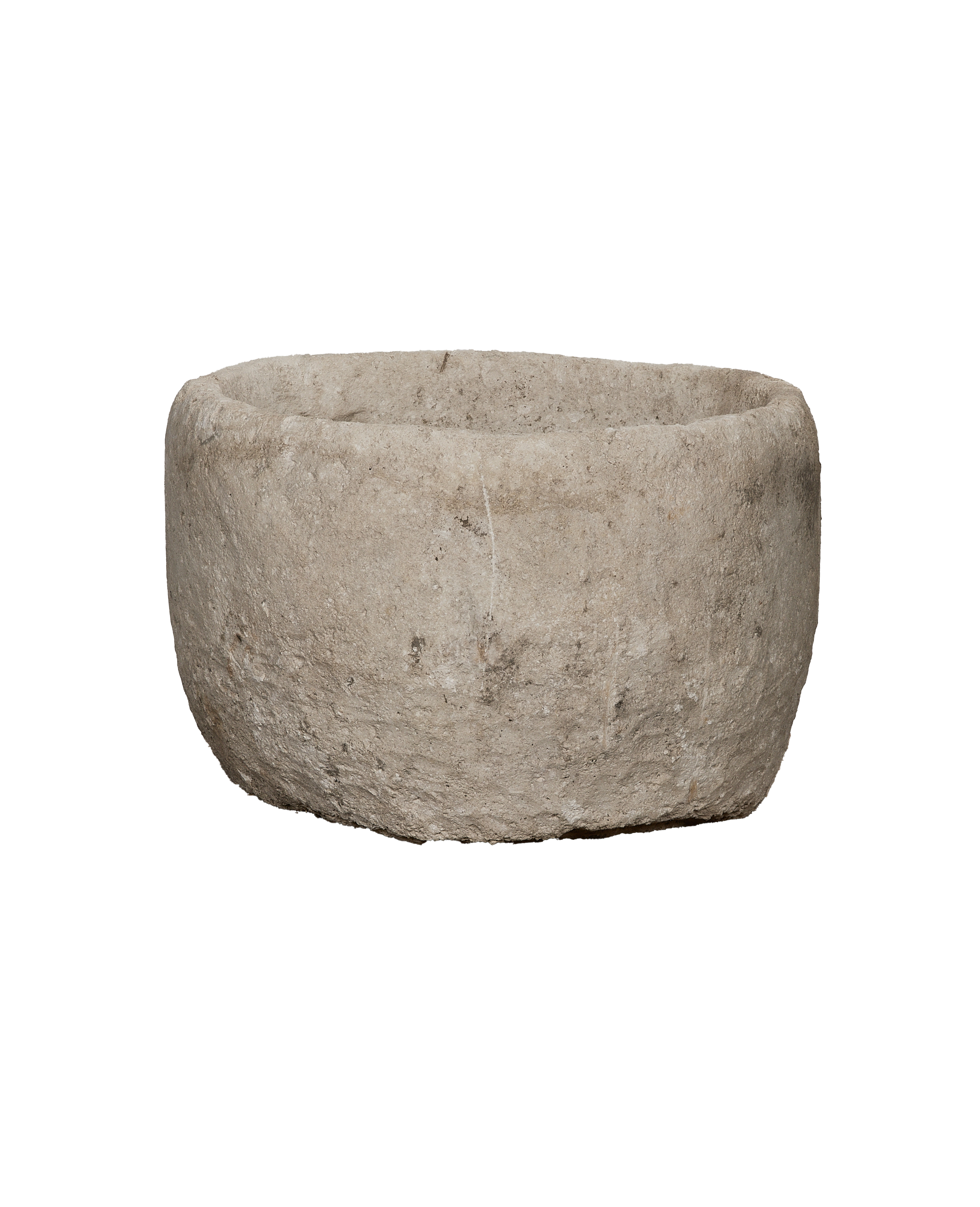 Vintage limestone trough, rough aged texture, rounded rim