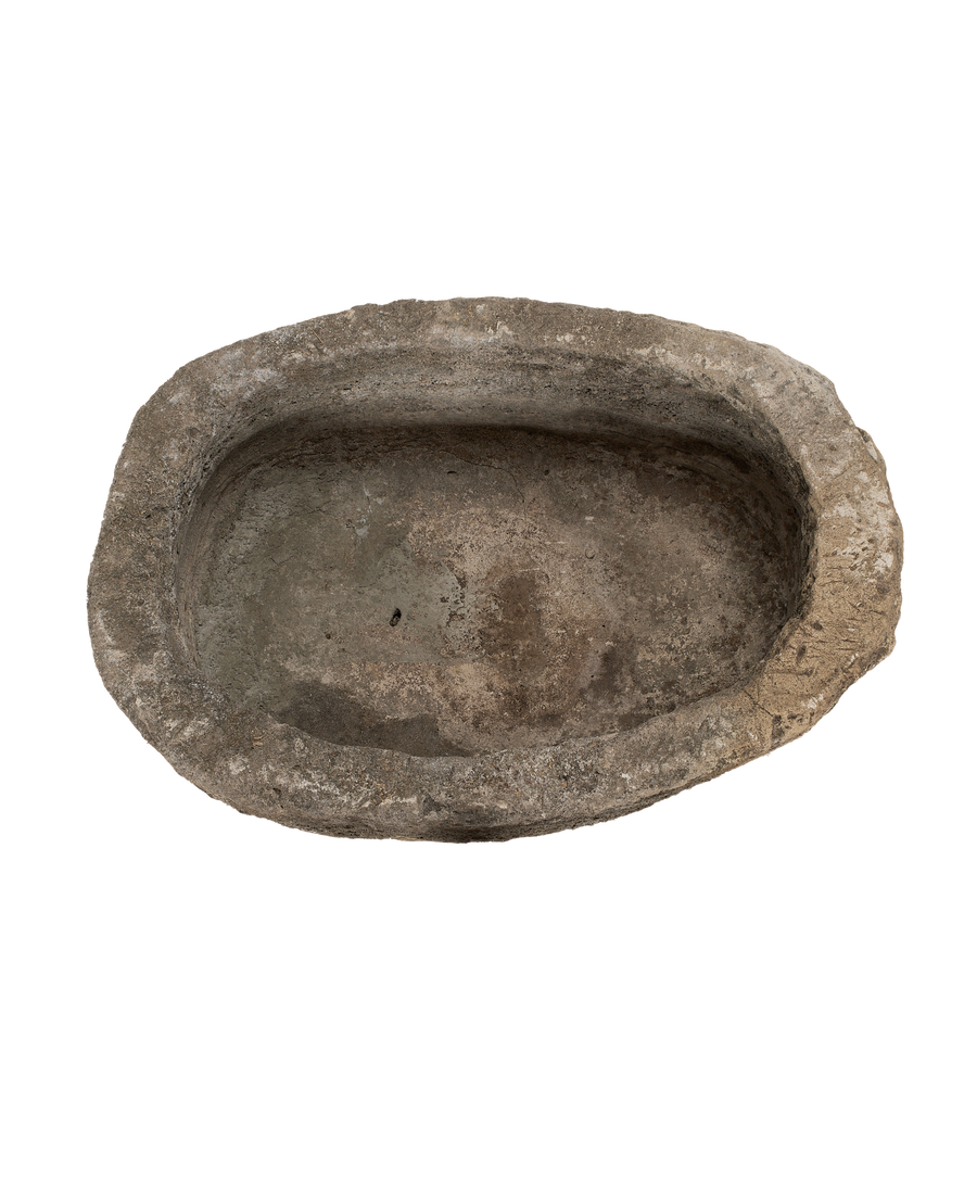 Vintage Indonesian limestone trough, oblong shape, weathered interior texture from