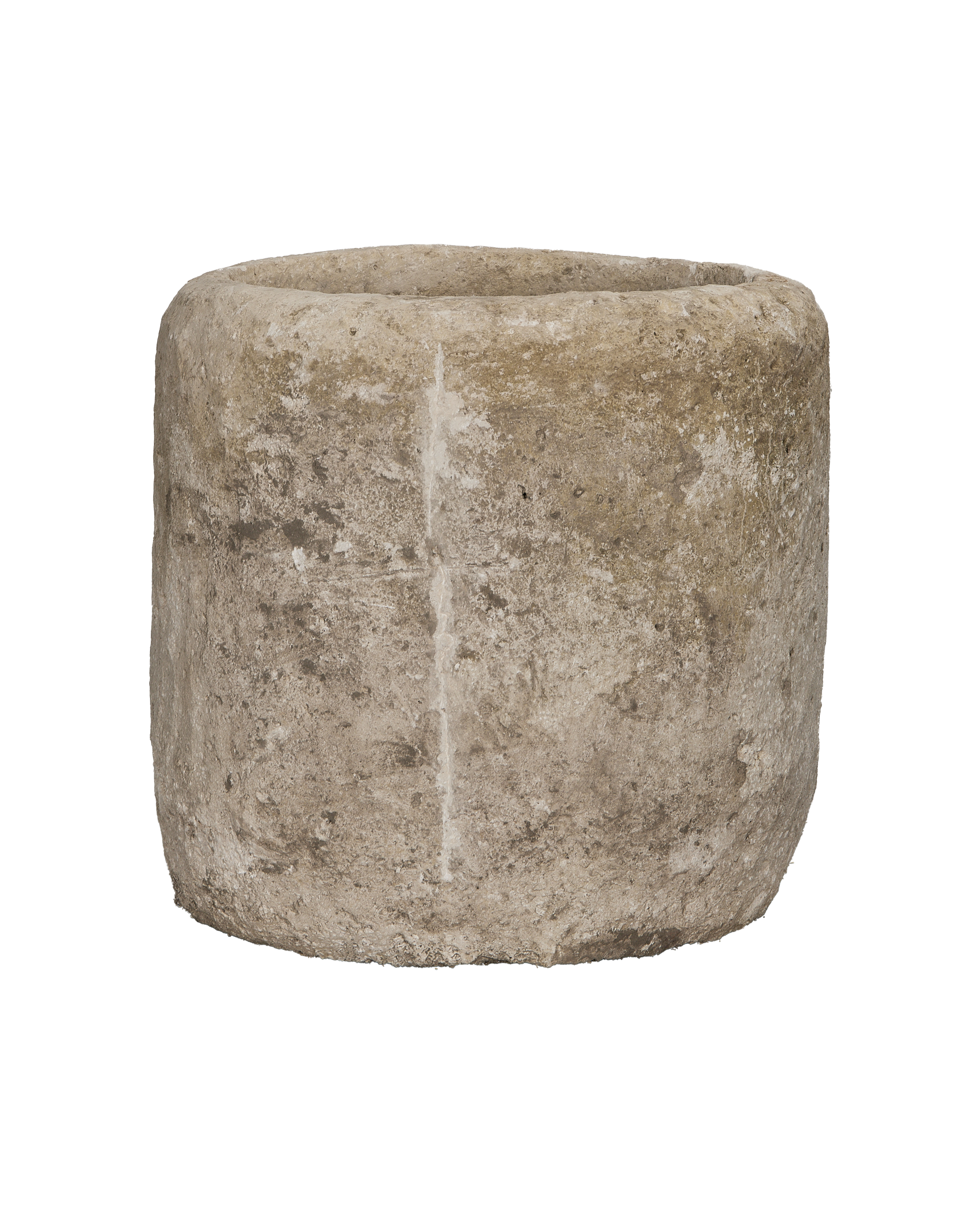 Vintage Indonesian round limestone trough, showing weathered side texture and slight