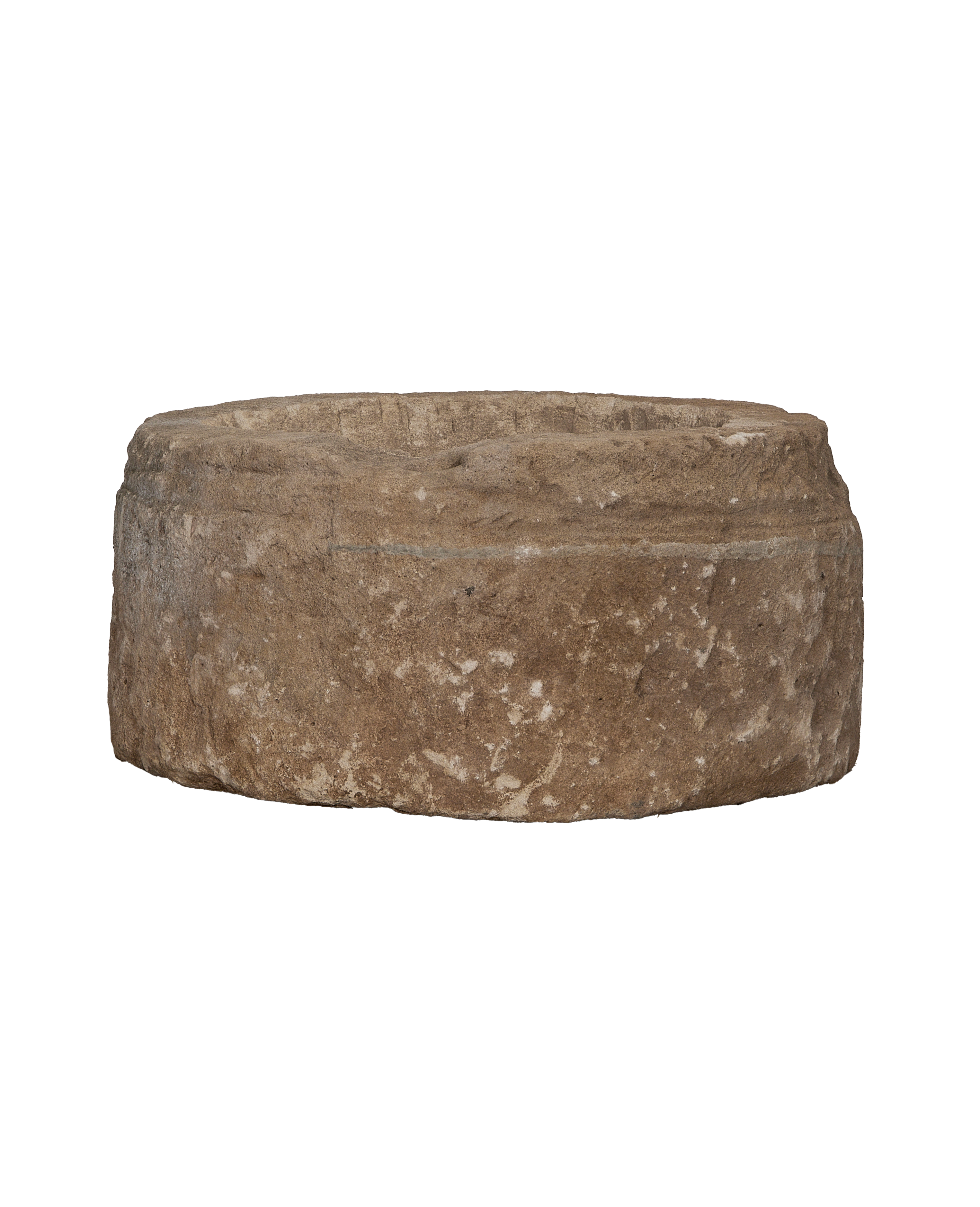 Vintage Indonesian round limestone trough, showing weathered side