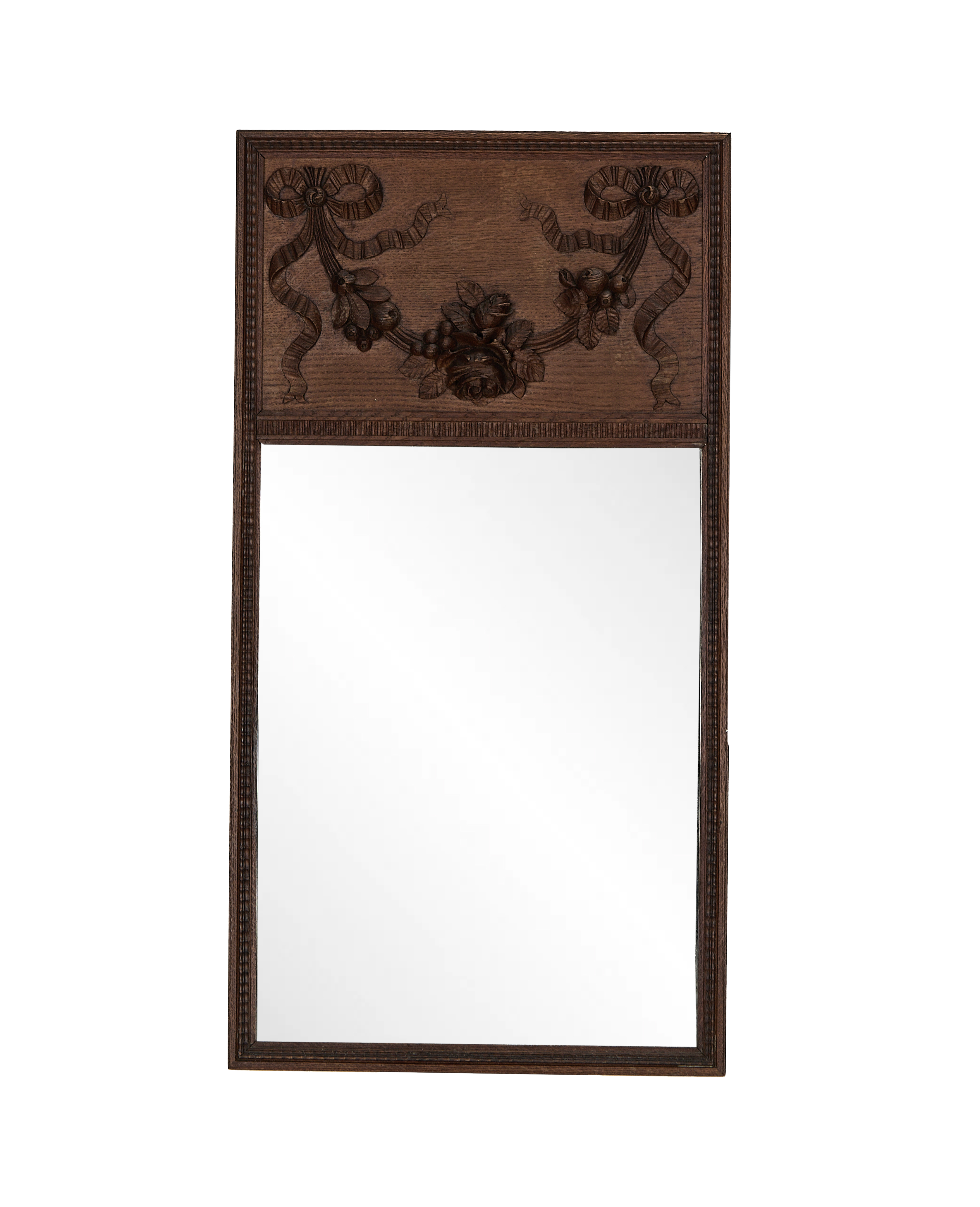 Vintage French carved oak mirror with floral and bow ribbon pediment.