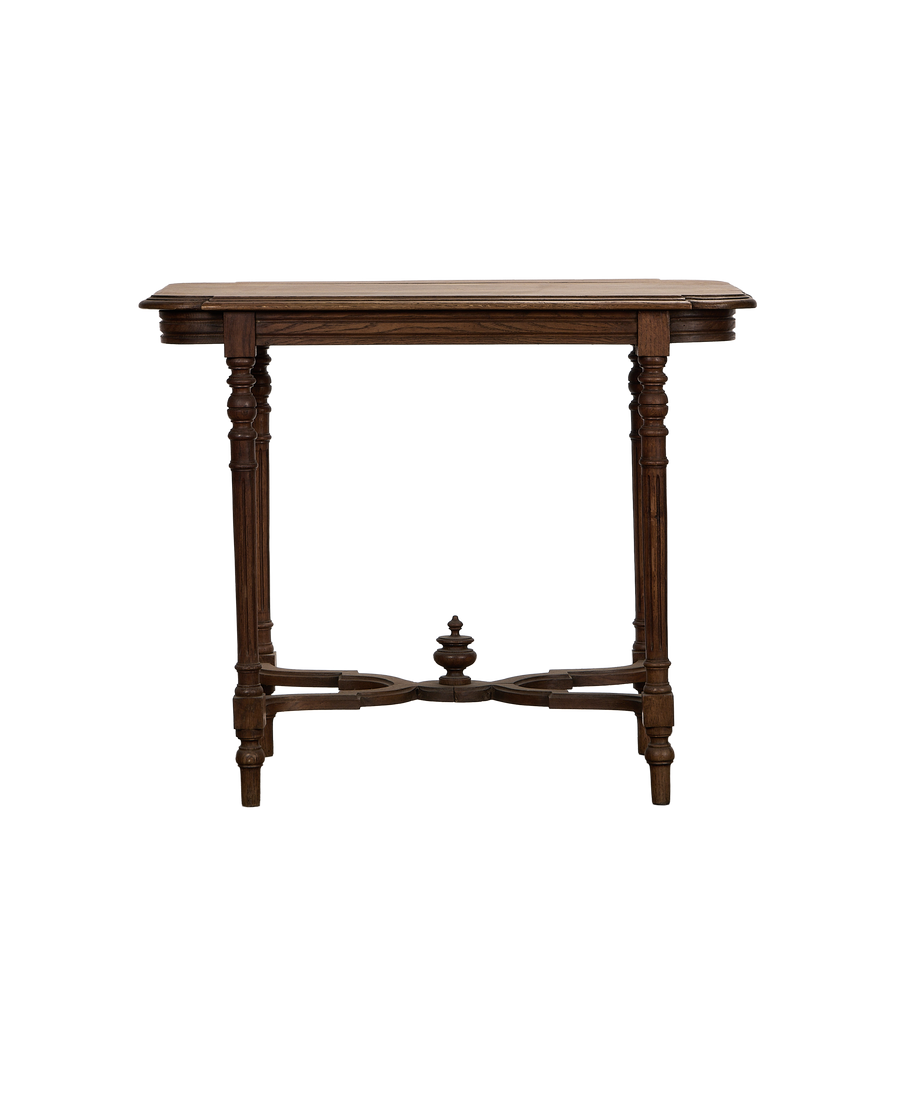 Vintage French Louis style oak table, side view, showing carvings and stretcher.