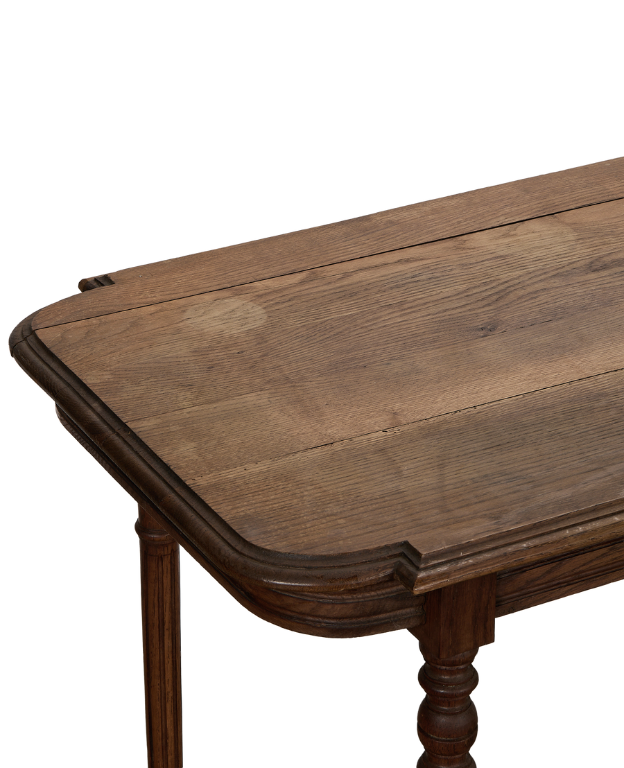 Vintage French Louis style oak table top with carved edge detail, showcasing grain and condition.