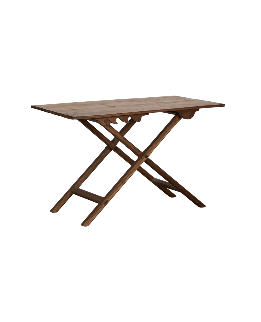 Vintage French adjustable oak wine table, showing hinged trestle legs and decorative carved skirting.