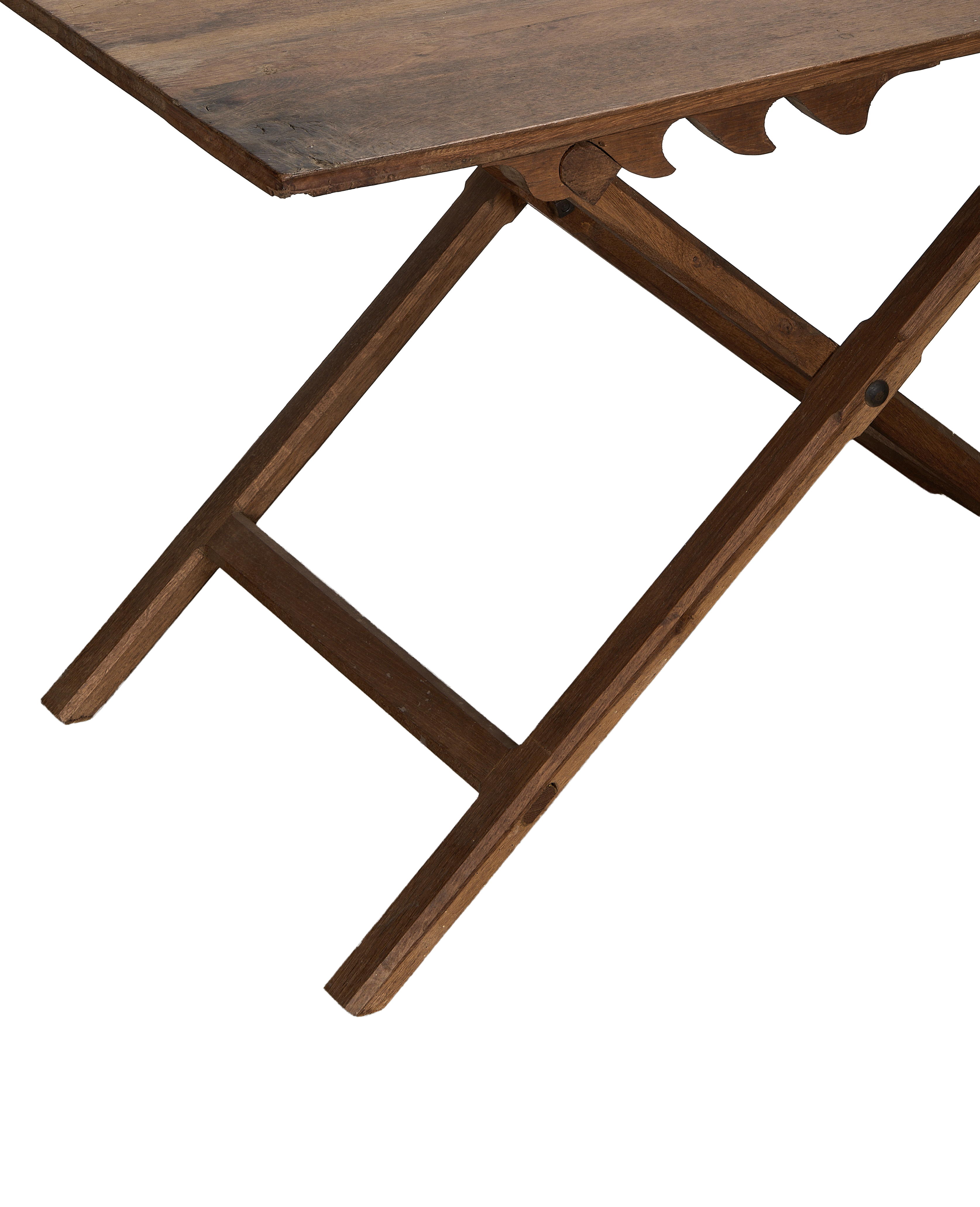 Vintage French adjustable wine table, showing hinged oak folding mechanism and ornate tabletop edge.