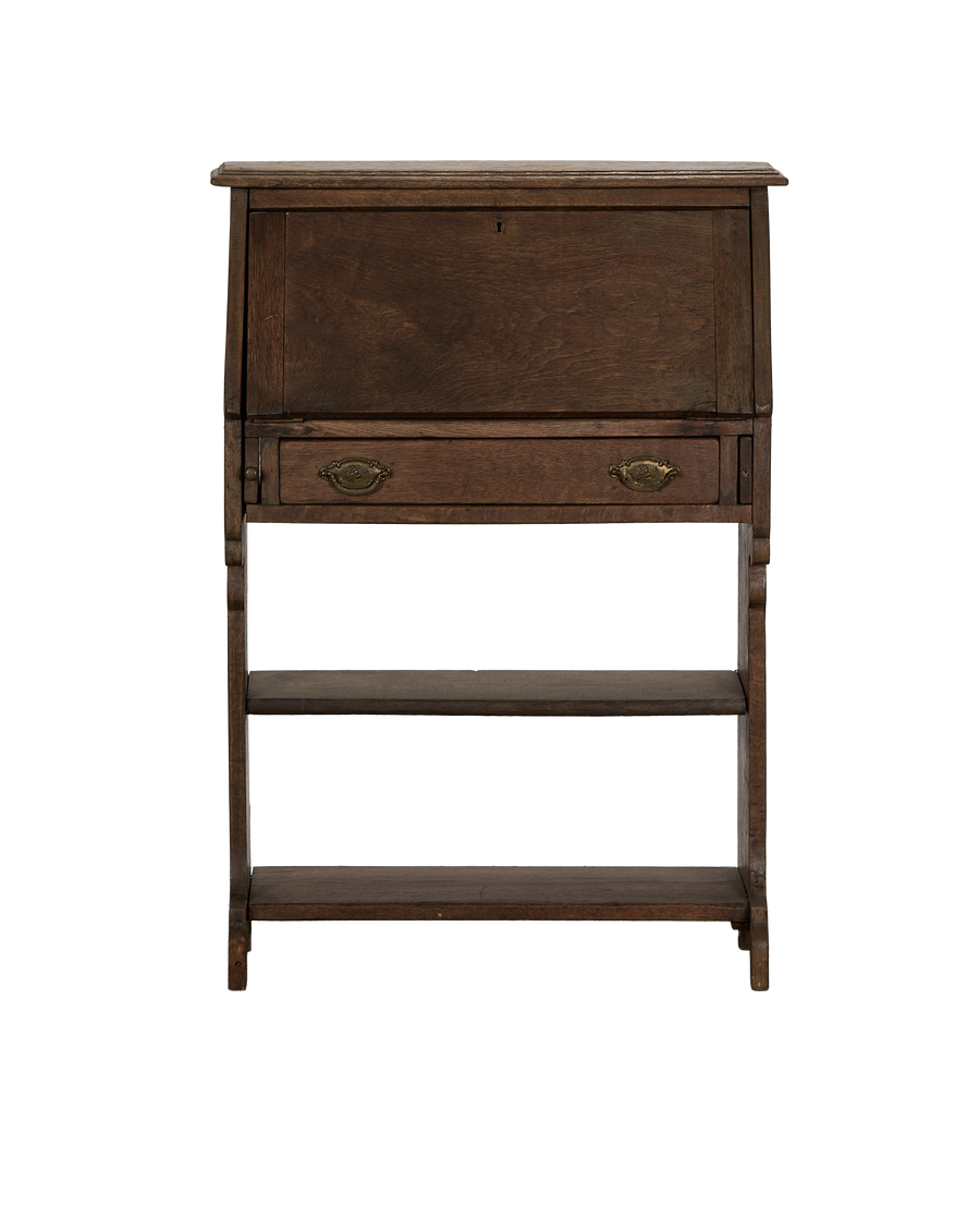 Vintage French oak secretary desk (closed) with drop-front, drawer, and shelves.