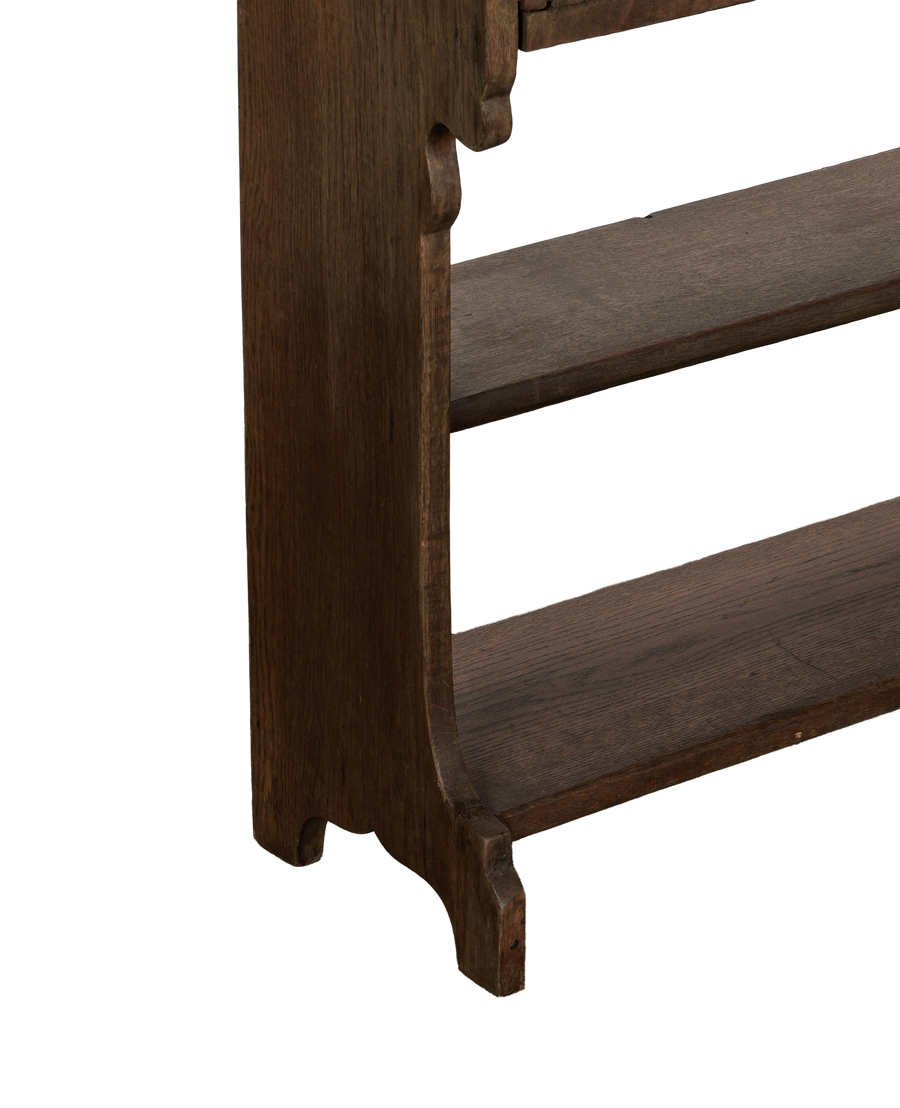 Vintage French oak secretary cabinet desk, close-up of side support and shelf.