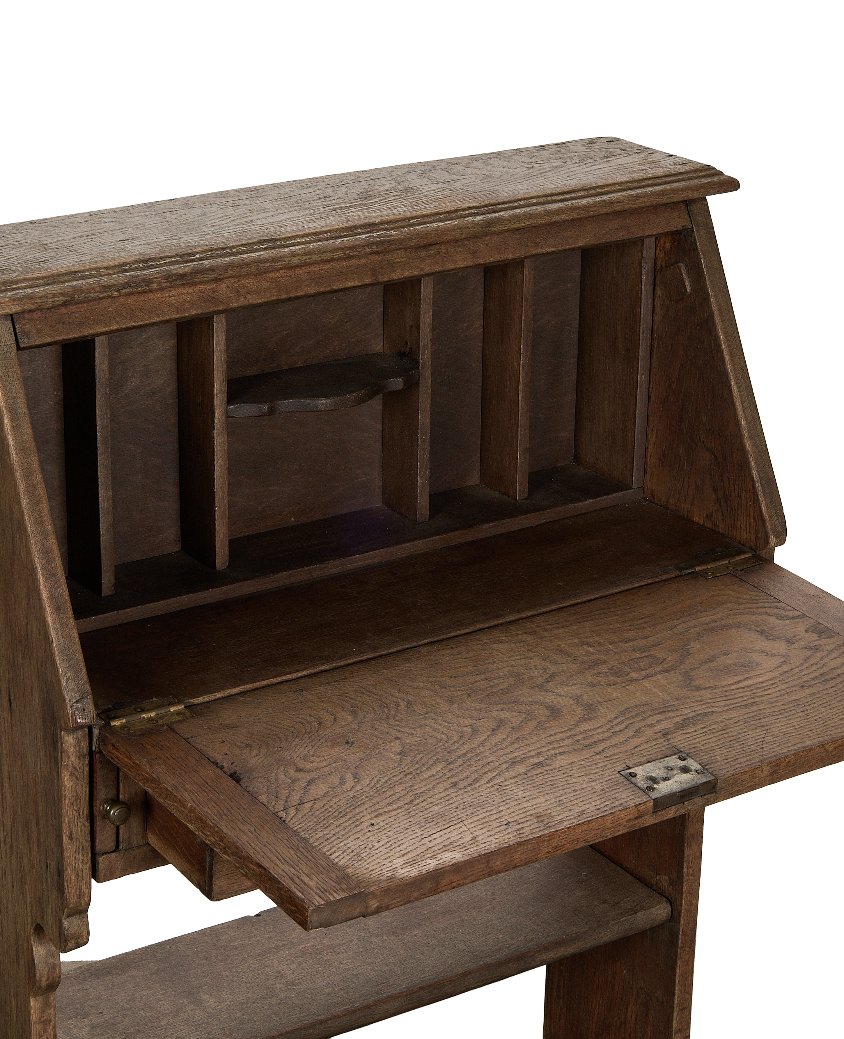 Vintage French oak secretary desk with drop-down writing surface and internal pigeonholes.