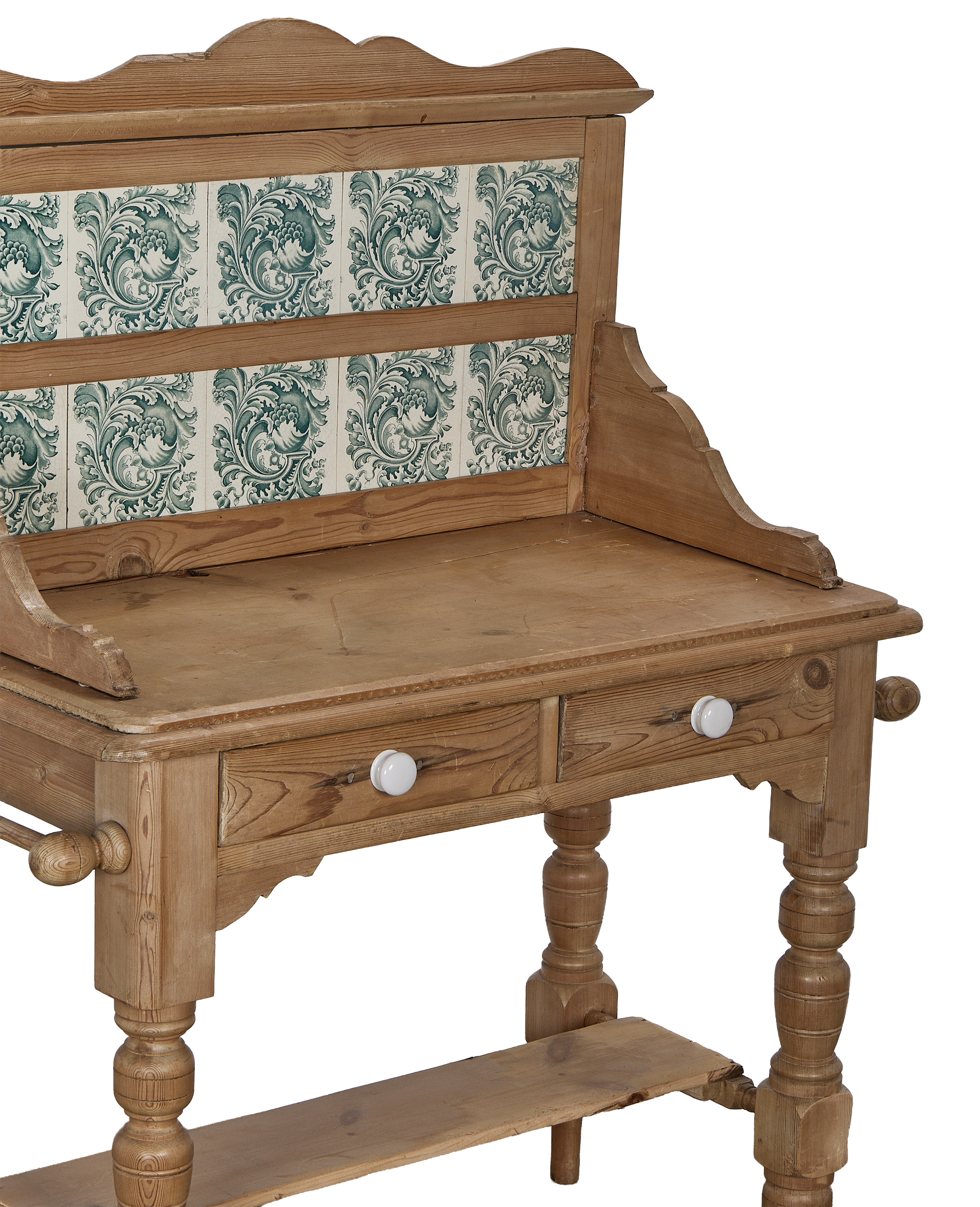 Vintage French oak cabinet, showing tiled backsplash detail, white ceramic knobs, and turned legs.