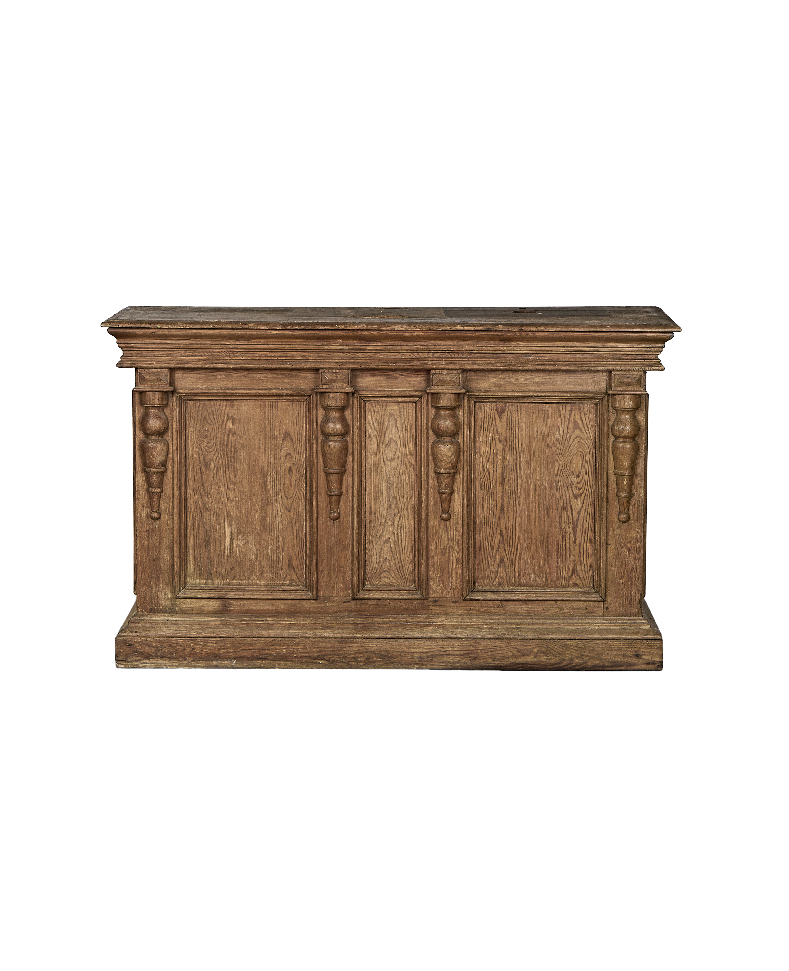 Vintage French oak shop counter, natural light brown wood, carved baluster details.