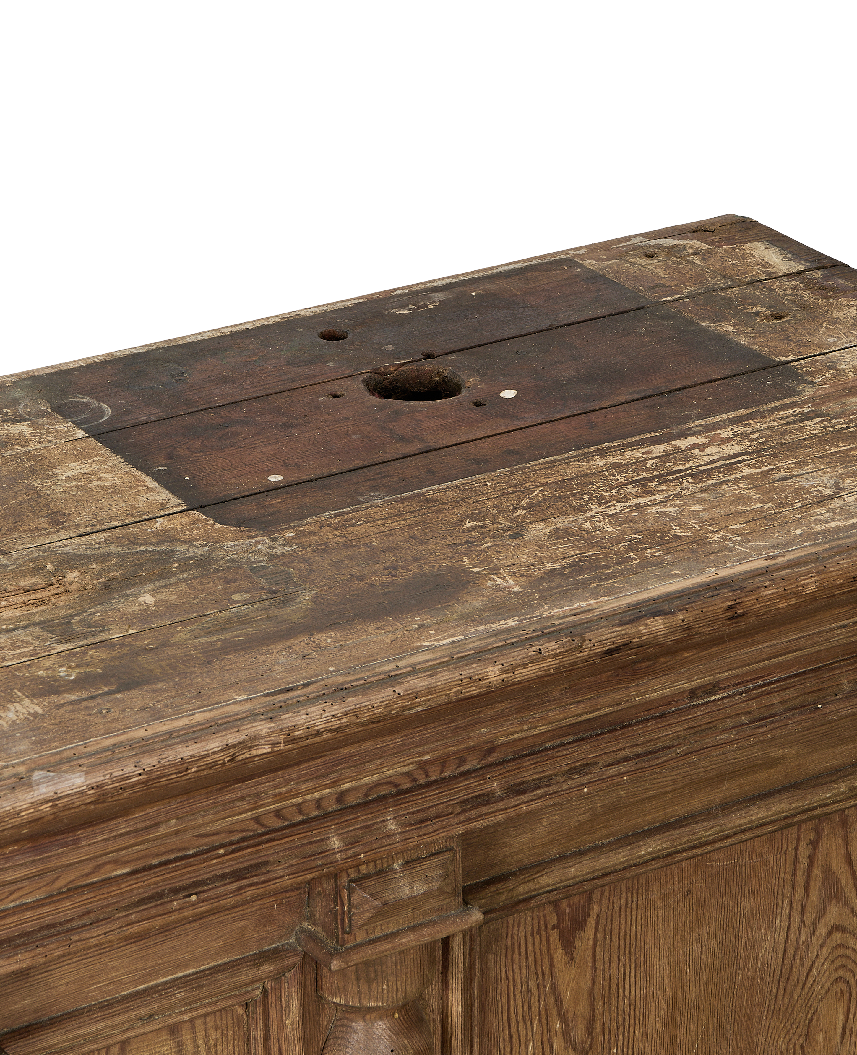 Vintage French oak shop counter's distressed, aged wood top with central hole.