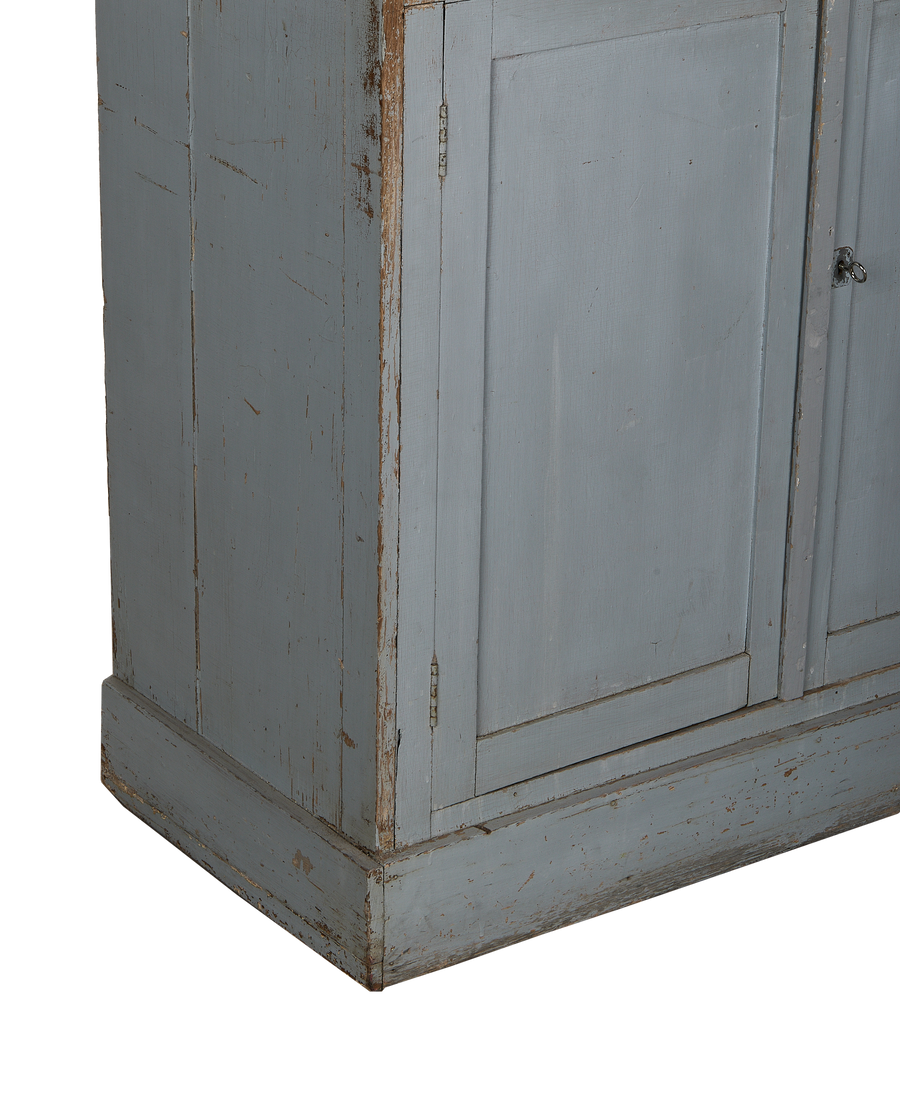 Vintage French oak cabinet, distressed light blue paint, showing side panel, door, and base.