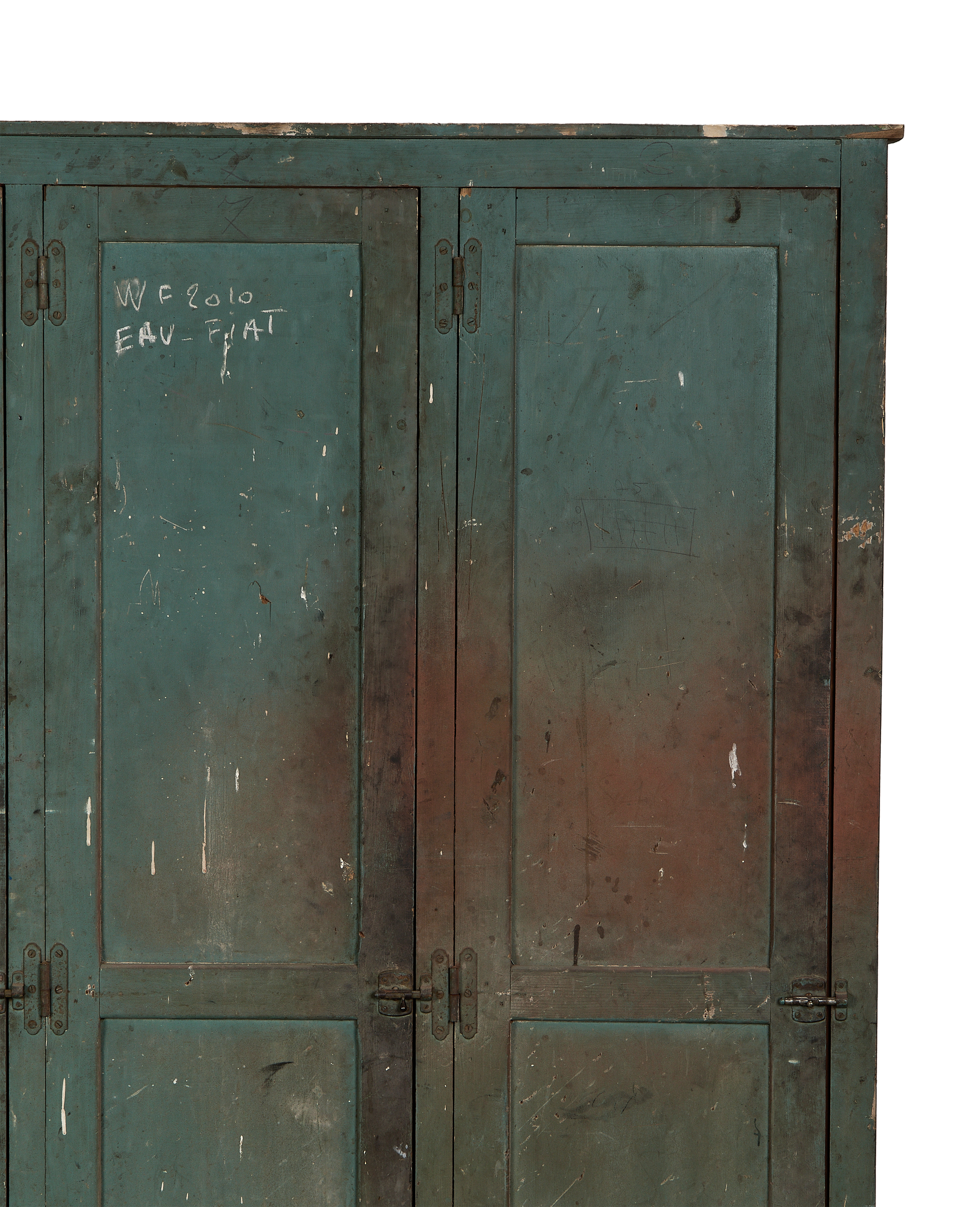 Vintage French oak locker cabinet doors, distressed teal paint with chalk marks and rustic hinges.