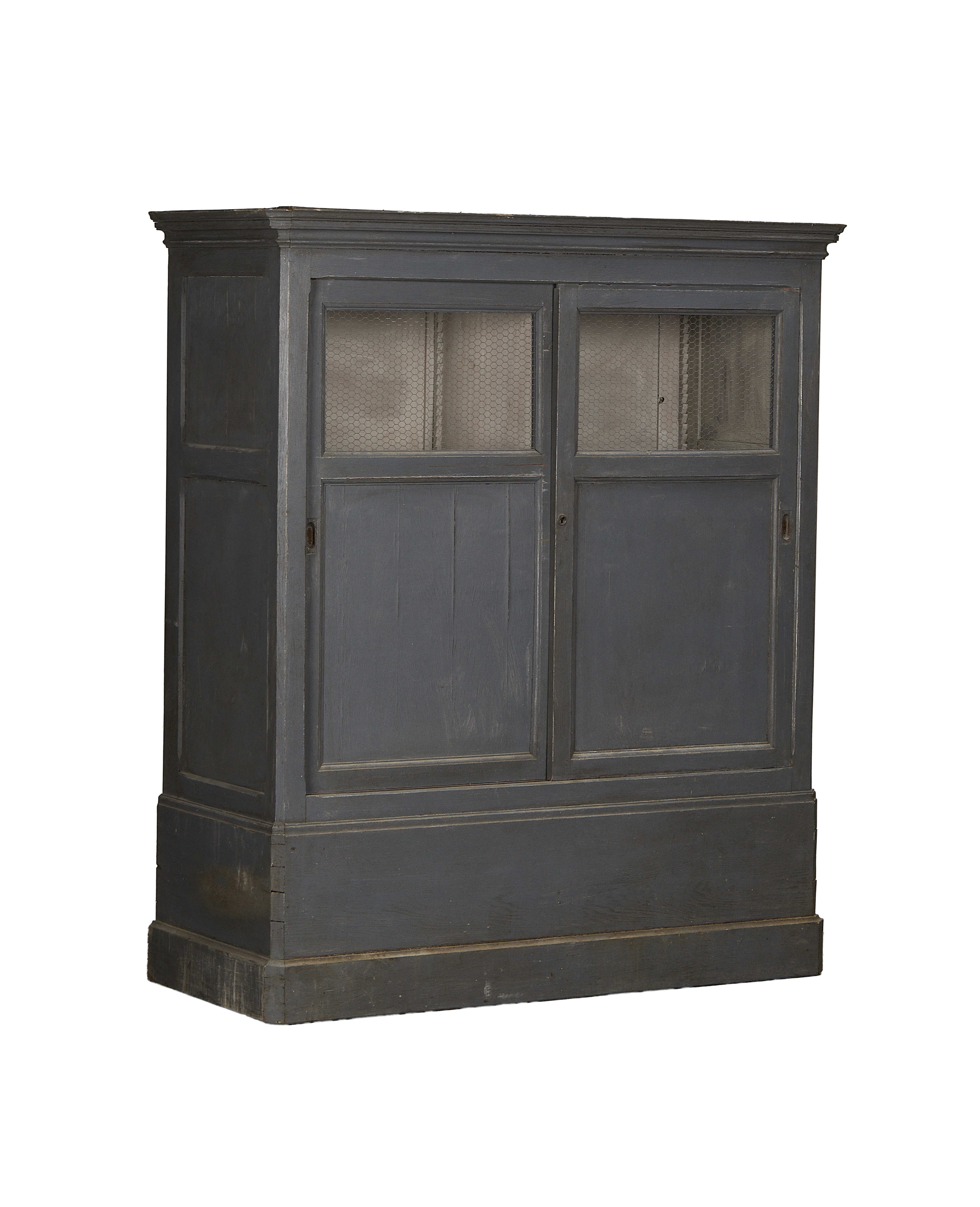 Vintage French oak cabinet, painted gray, featuring screened wire doors and detailed base molding.